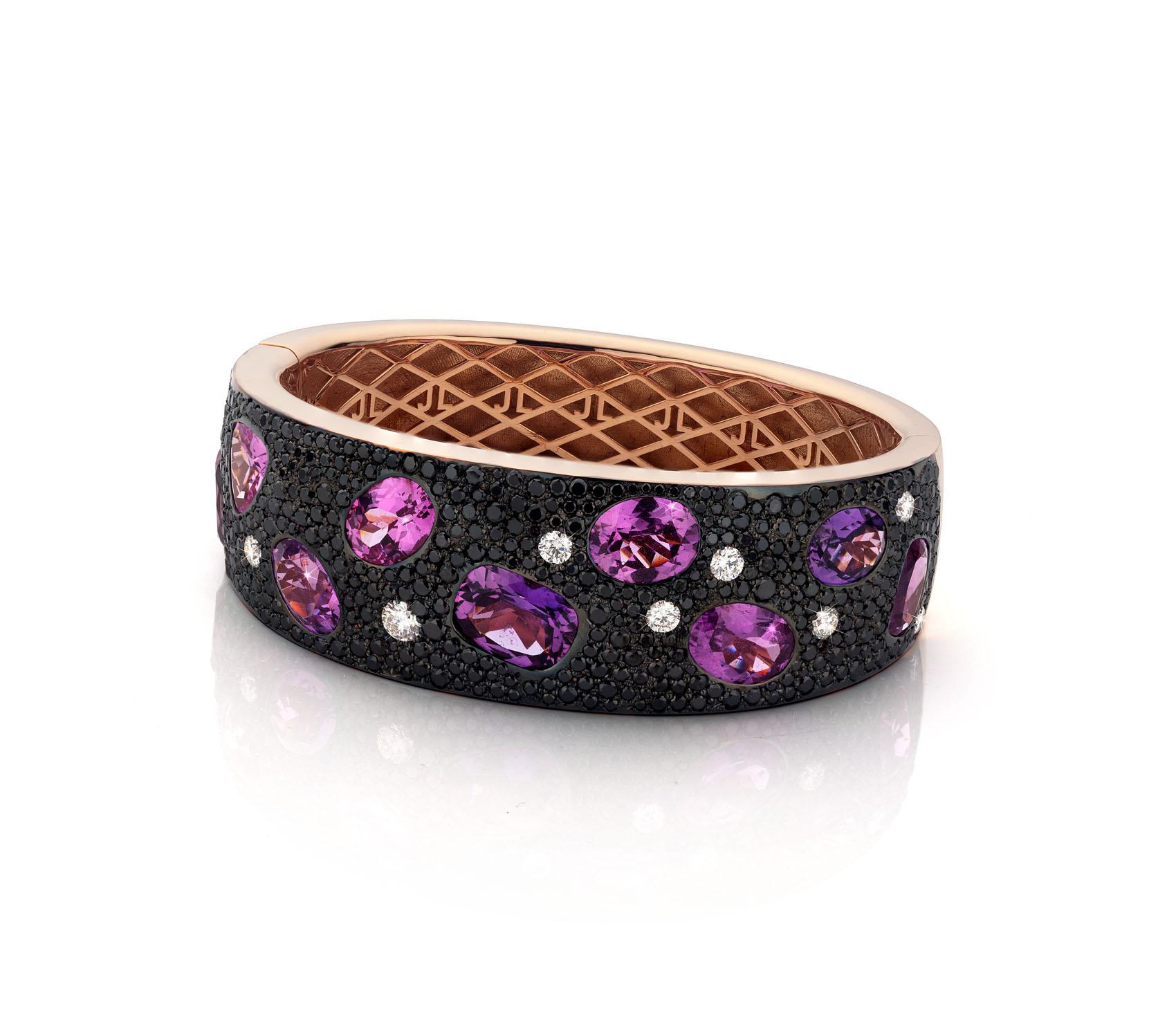 18 Karat Rose gold Bracelet featuring 23.04 carat Pink Sapphire stones.

Set with hand-engraved 8,29 carat Black Diamonds and 1,03 carat White Diamonds.

This is a one of a kind design made by Jochen Leën to showcase two of the world's rarest types