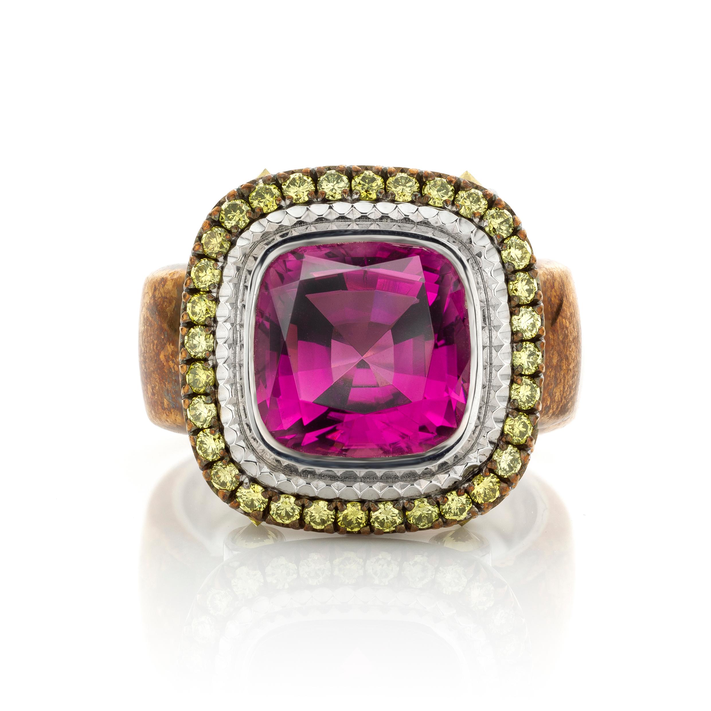 One of a kind ring 'Pira Pora' created by Belgian-based jewellery artist and rare gem collector : 'Jochen Leën', in 18K White Gold and Bronze showcasing a Cushion-cut Brazillian Pink Tourmaline centerstone, pave set Fancy Green Brilliant-cut