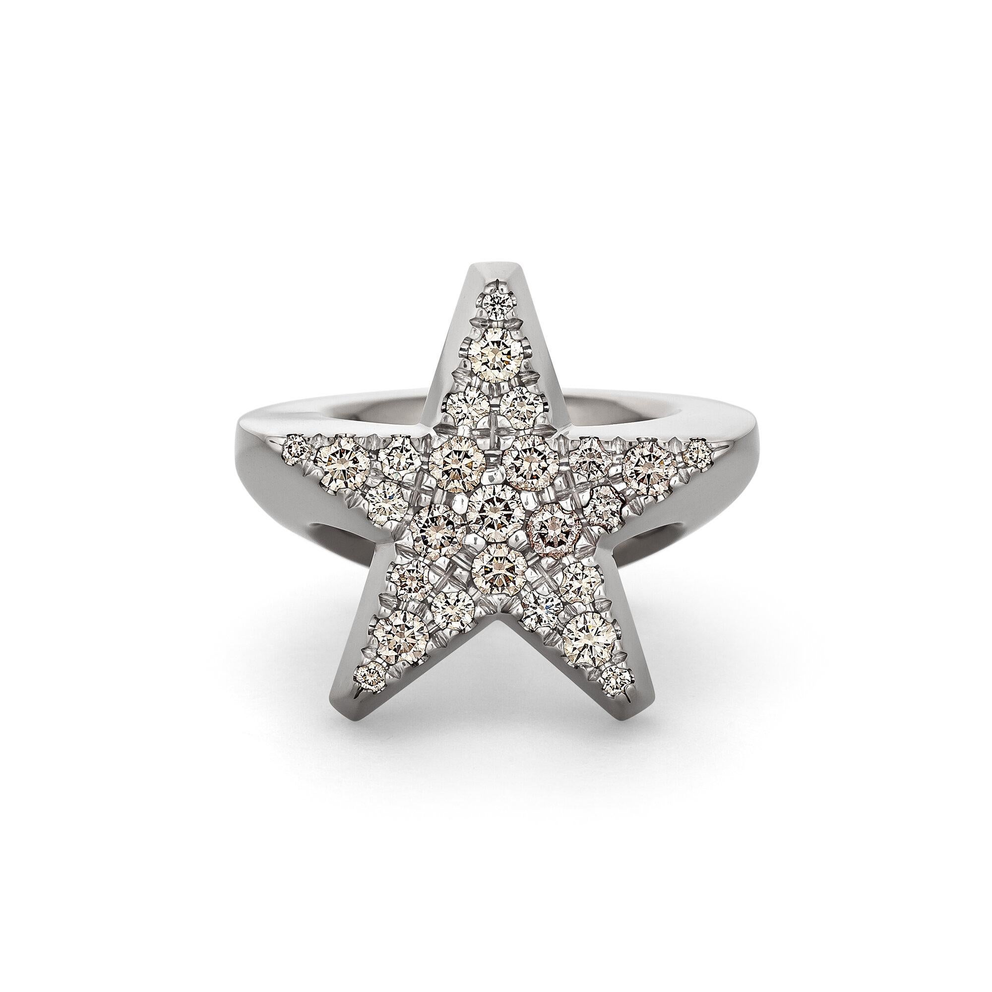 Star light, Star bright, First star I see tonight; I wish I may, I wish I might, Have this star ring I see tonight!  And YOUR wish will be granted with this Jochen Pohl handmade natural cognac color round cut diamond and 18 karat white gold star