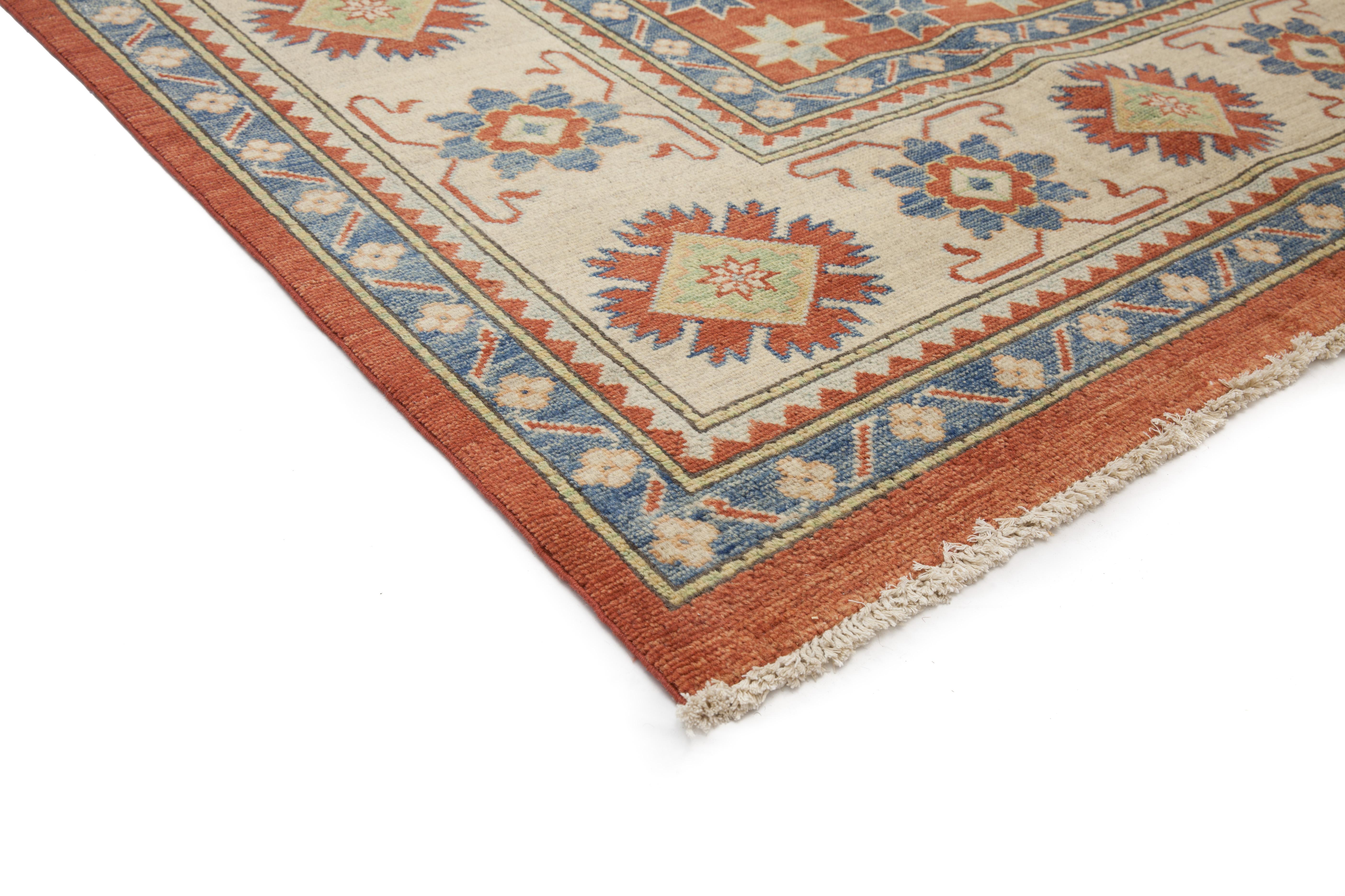 The Kazak collection of area rugs takes its source from Caucasian rugs of the Kazak and Shirvan areas. Multiple medallions, centralized patterns, and all-over layouts have all been given a geometric treatment. Saturated reds and blues are the main