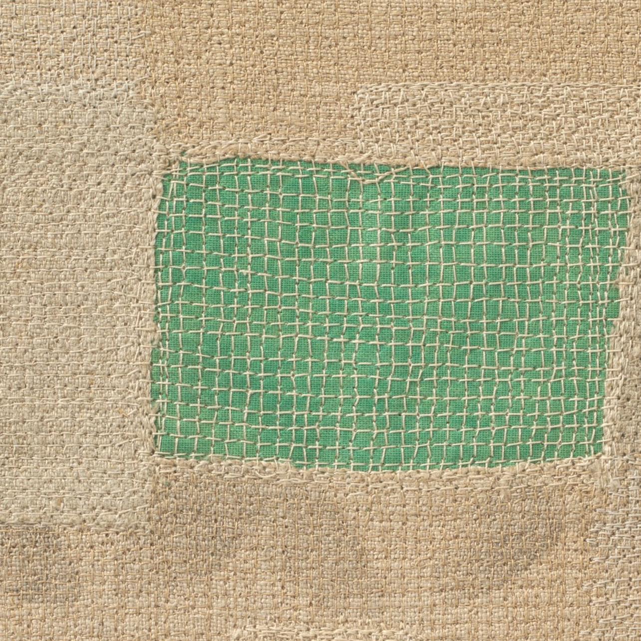 Reclaimed linen, bookcloth from discarded library books by Ernest Hemingway, stencils, thread, and mull.