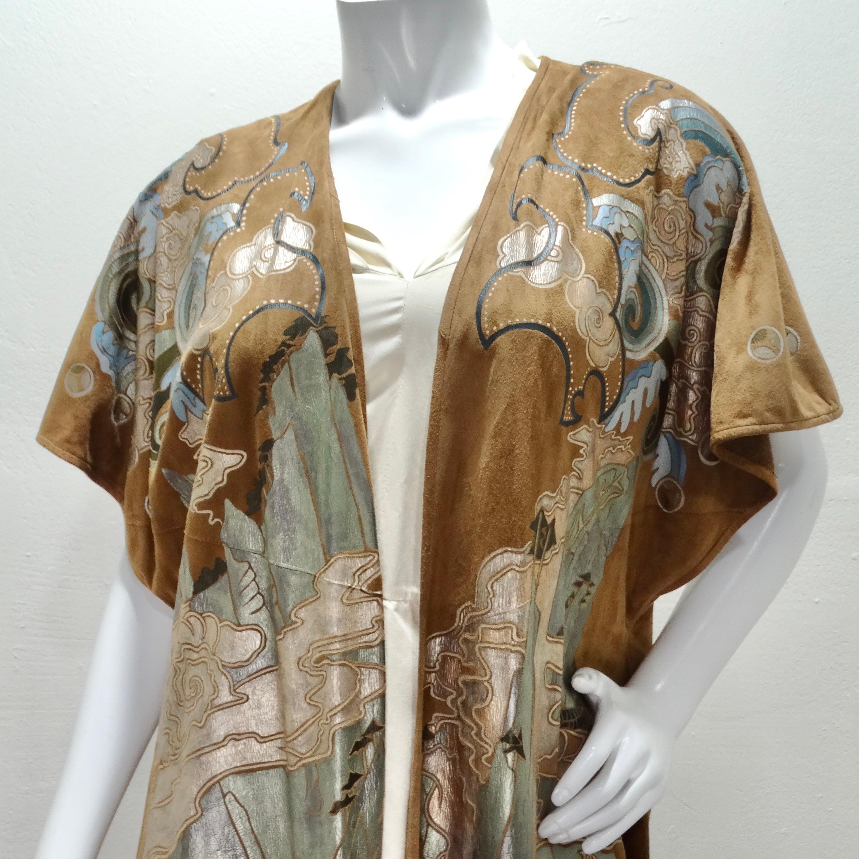 Elevate your style with the Joe Brand 1980s Hand Painted Suede Short Sleeve Duster, a one-of-a-kind statement piece that's a true work of art. This short-sleeved brown suede duster jacket boasts exquisite hand-painted designs that depict ocean