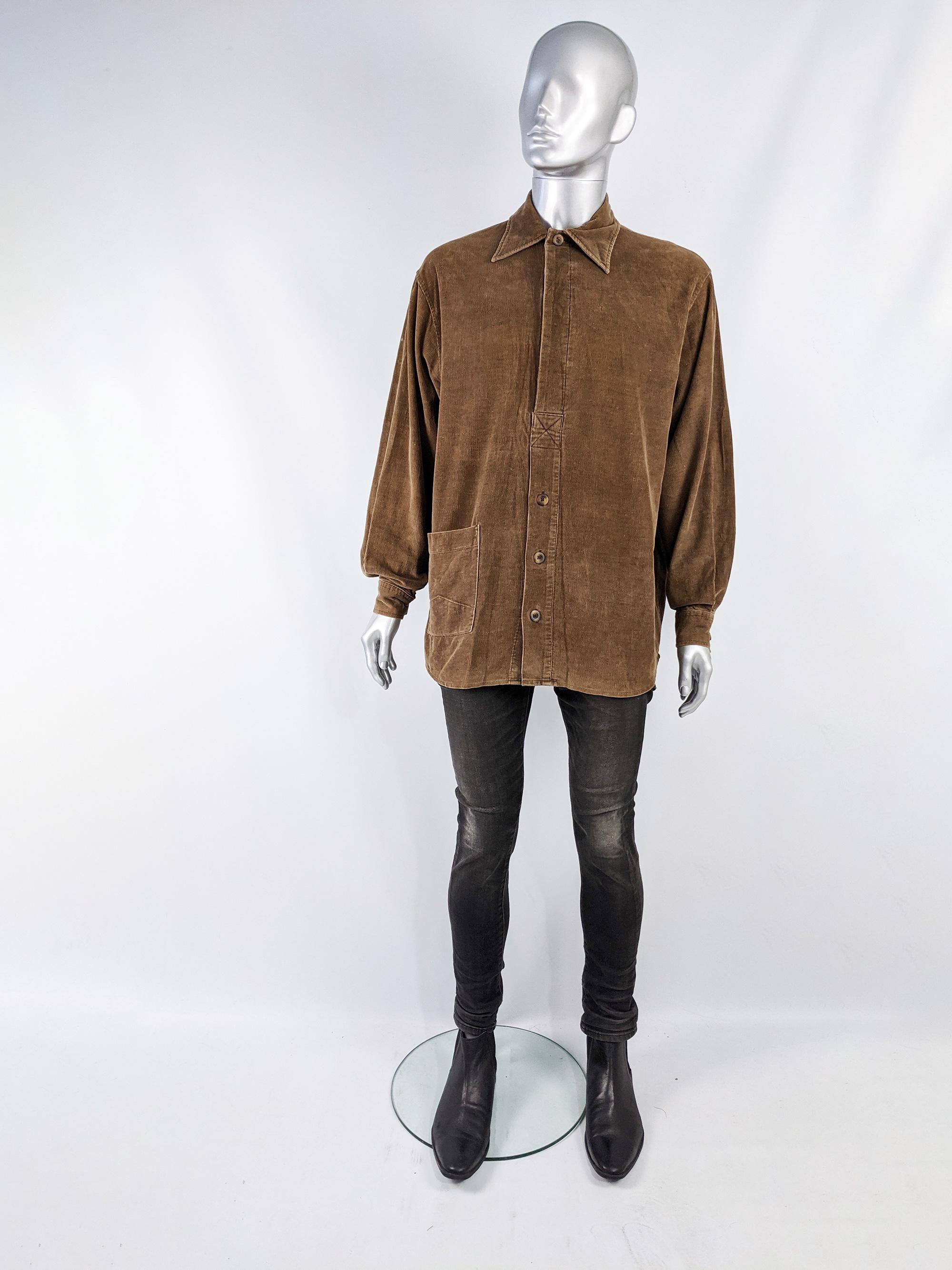 An amazing and rare vintage mens shirt by pioneering black British fashion designer, Joe Casely-Hayford for his Hayford line (founded in 1992). In a brown corduroy fabric with an artist smock / workwear inspired cut, it has button fly front