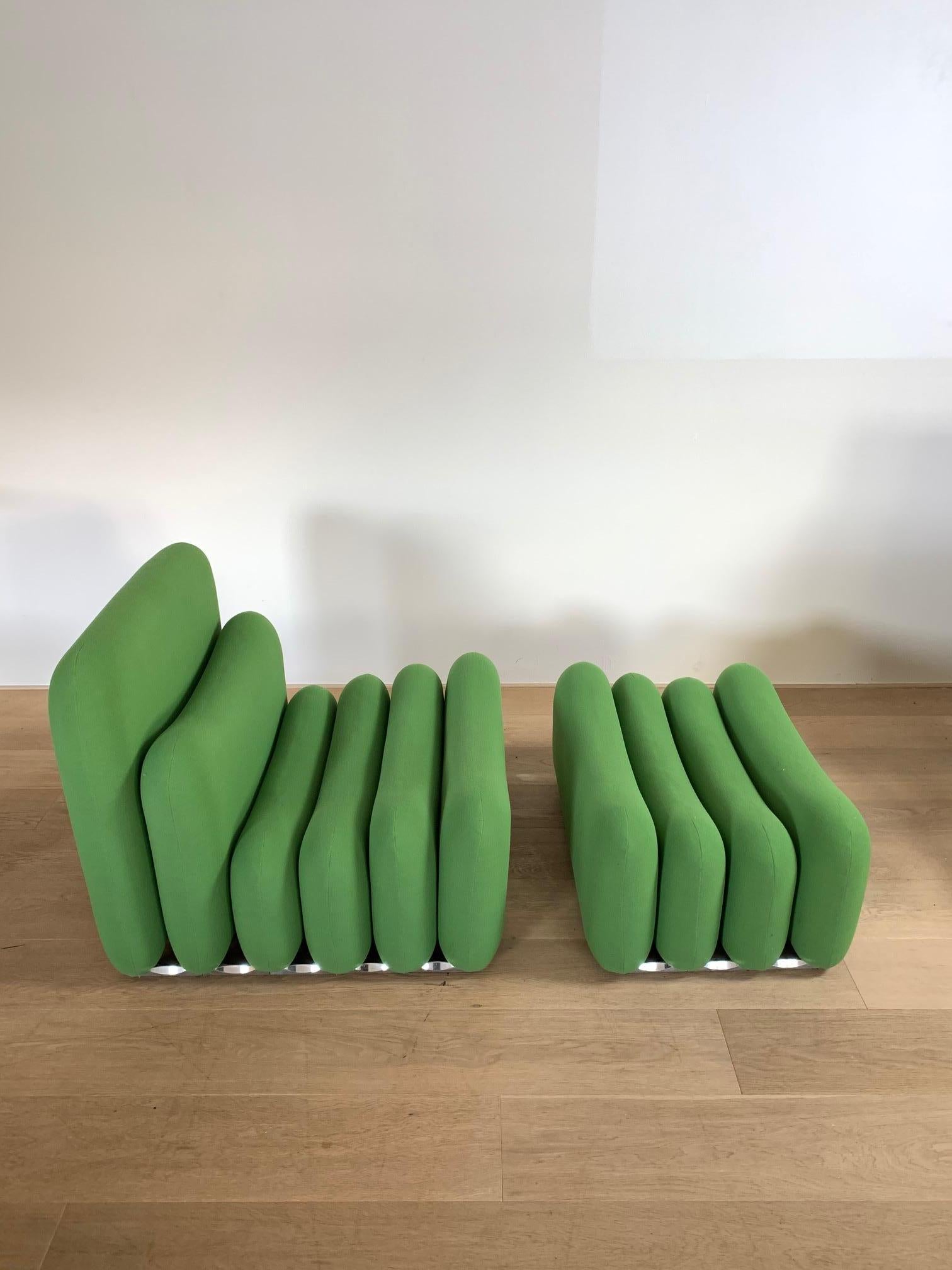 Joe Colombo's innovative Additional-System lounge chair with ottoman utilizes various sized cushions connected by aluminum pins impressed with Sormani Logo. Green jersey wool lining.
Literature: Joe Colombo and Italian Design of the 1960s, Favata,