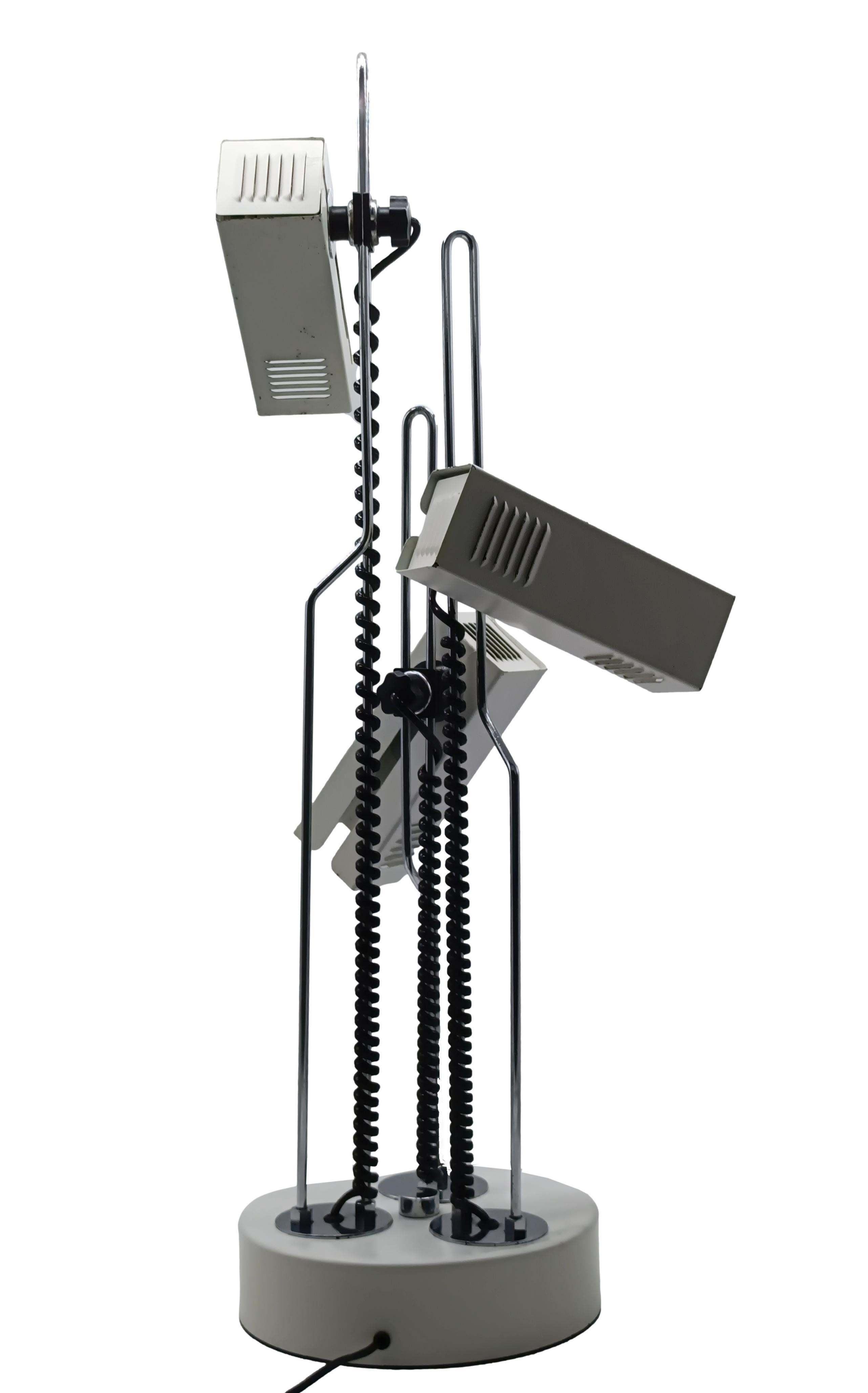 White and Chrome Metal Table Lamp, with 3 Adjustable Lights, Italy 1970s. Design Attr. to Joe Colombo, an Italian industrial designer known for his futuristic style and interest in multifunctional modular systems.