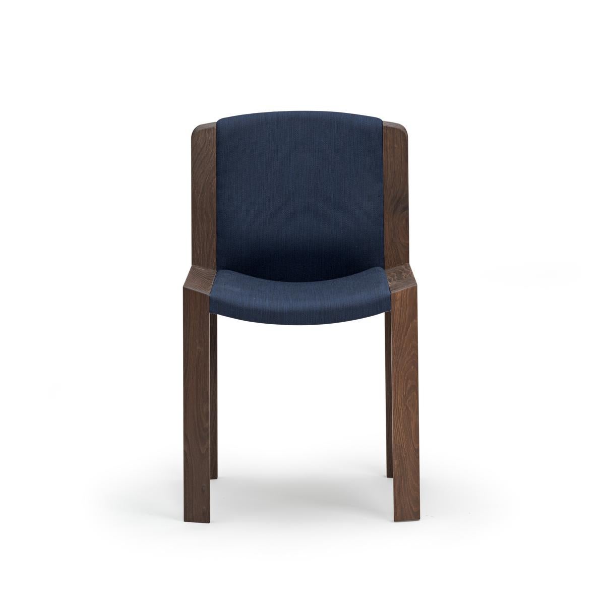 Chair designed by Joe Colombo in 1965.

Designed by the forward-thinking Italian designer Joe Colombo, Chair 300 is a beautiful example of his functional design sensibility. Upholstered seat and back gently curved inside a modest, clear wooden