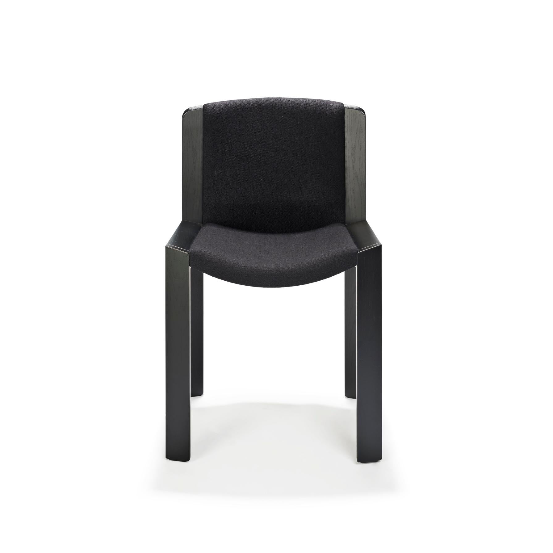 Chair designed by Joe Colombo in 1965. 

Designed by the forward-thinking Italian designer Joe Colombo, Chair 300 is a beautiful example of his functional design sensibility. Upholstered seat and back gently curved inside a modest, clear wooden