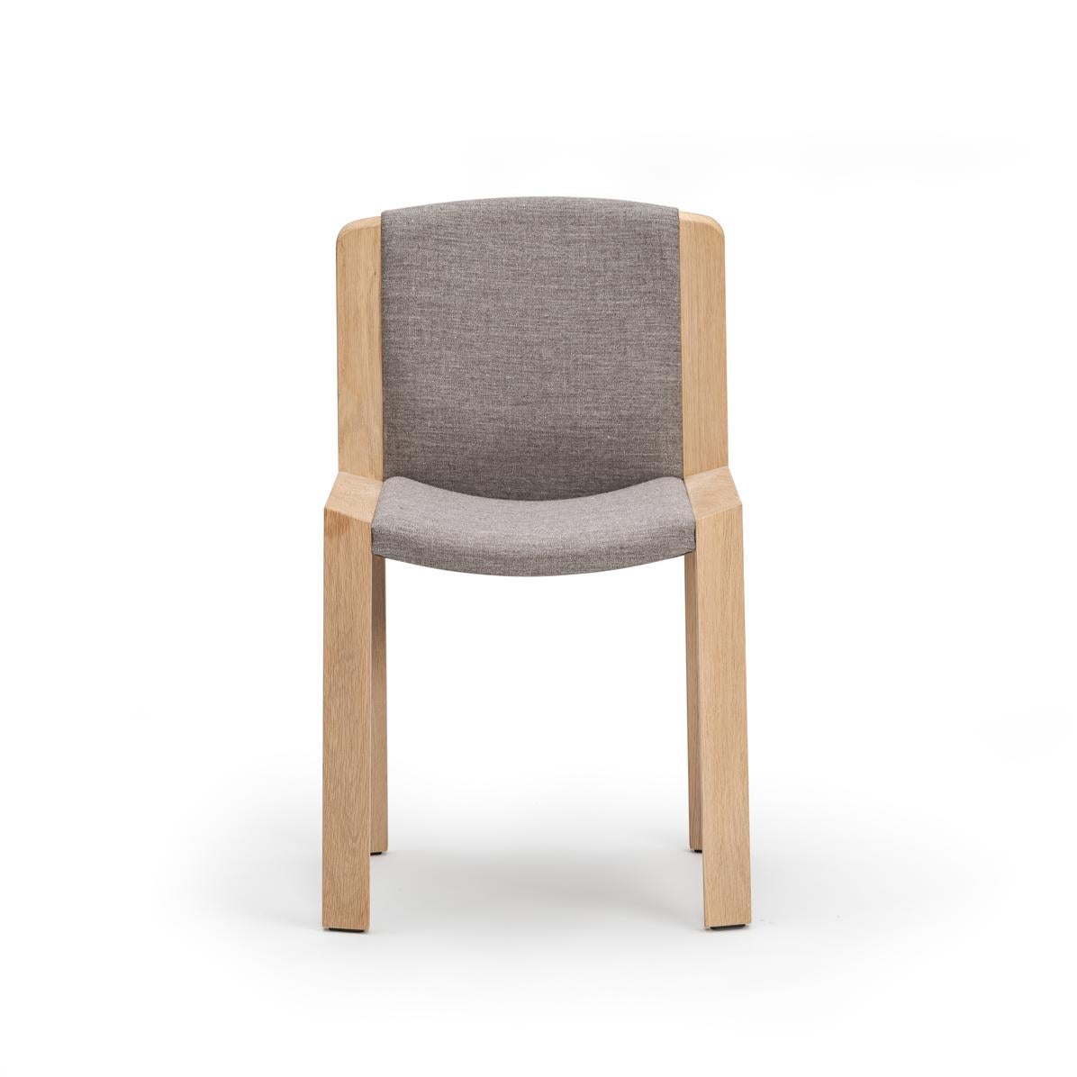 Chair designed by Joe Colombo in 1965. 

Designed by the forward-thinking Italian designer Joe Colombo, Chair 300 is a beautiful example of his functional design sensibility. Upholstered seat and back gently curved inside a modest, clear wooden