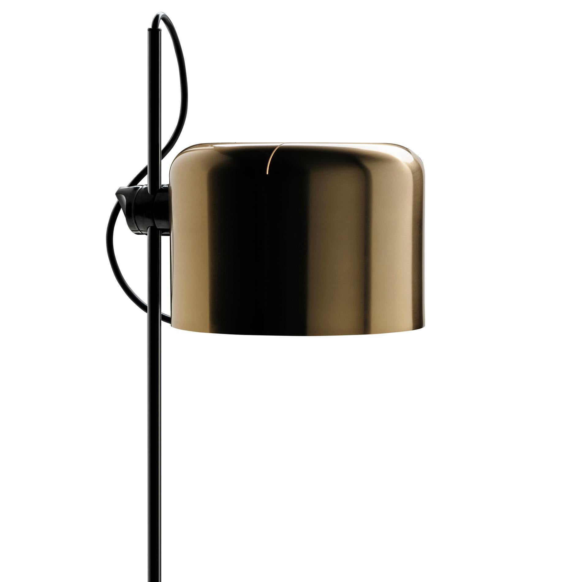 Floor lamp 'Coupé' designed by Joe Colombo in 1967.
Floor lamp giving direct light, lacquered metal base, chromium-plated stem, adjustable reflector in lacquered aluminium. Manufactured by Oluce, Italy.

It was 1967 when Joe Colombo designed Coupé,