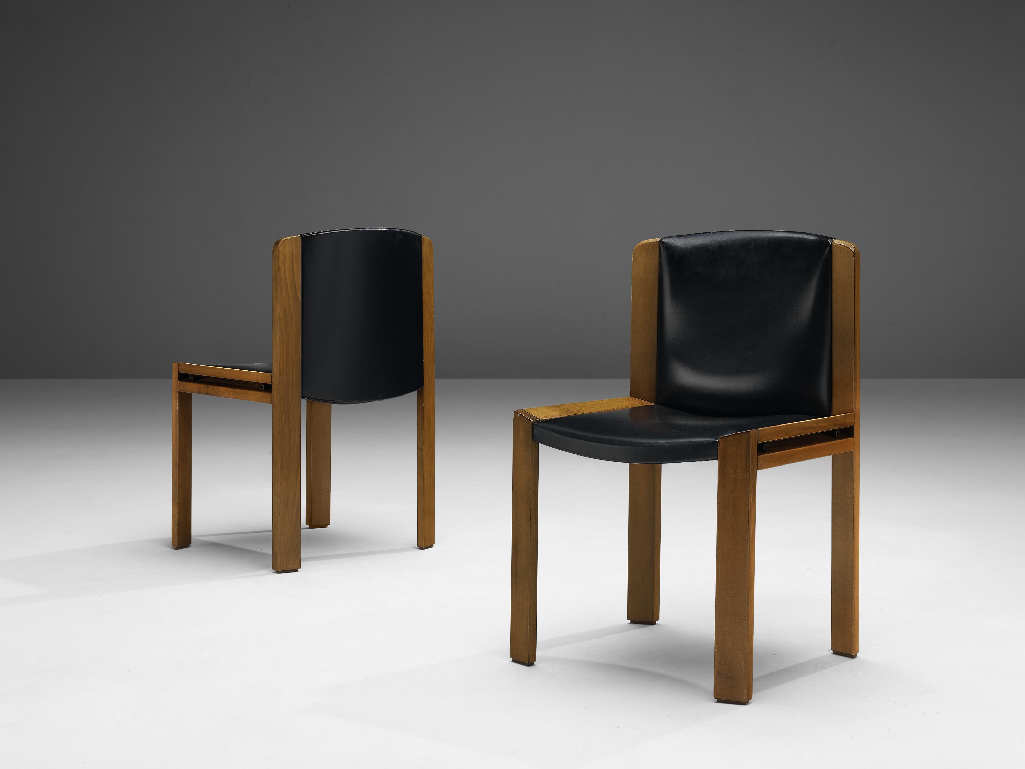 Joe Colombo for Pozzi, pair of dining chairs model '300', leatherette, wood, Italy, 1966.

Functionalist pair of dining chairs designed by Joe Colombo in 1966. Colombo's fascination with functionality meant he always focused on the user, which
