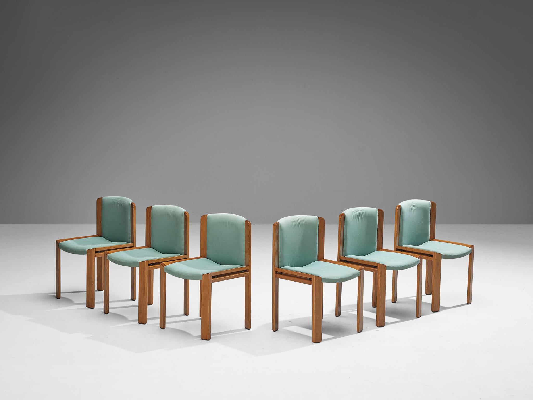Joe Colombo pour Pozzi, ensemble de six chaises de salle à manger, modèle '300', tissu, hêtre teinté, Italie, 1966.

En 1966, Joe Colombo a fabriqué un ensemble de six chaises de salle à manger connu sous le nom de modèle 