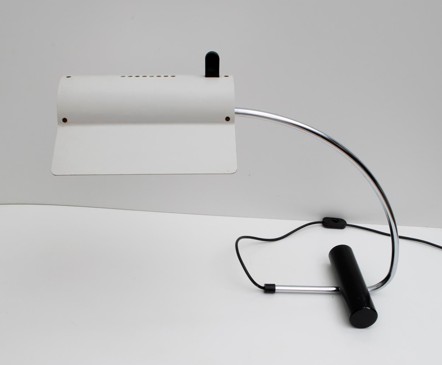Lamp designed by Joe Colombo, in ivory lacquered aluminum and structure in chromed and black metal.