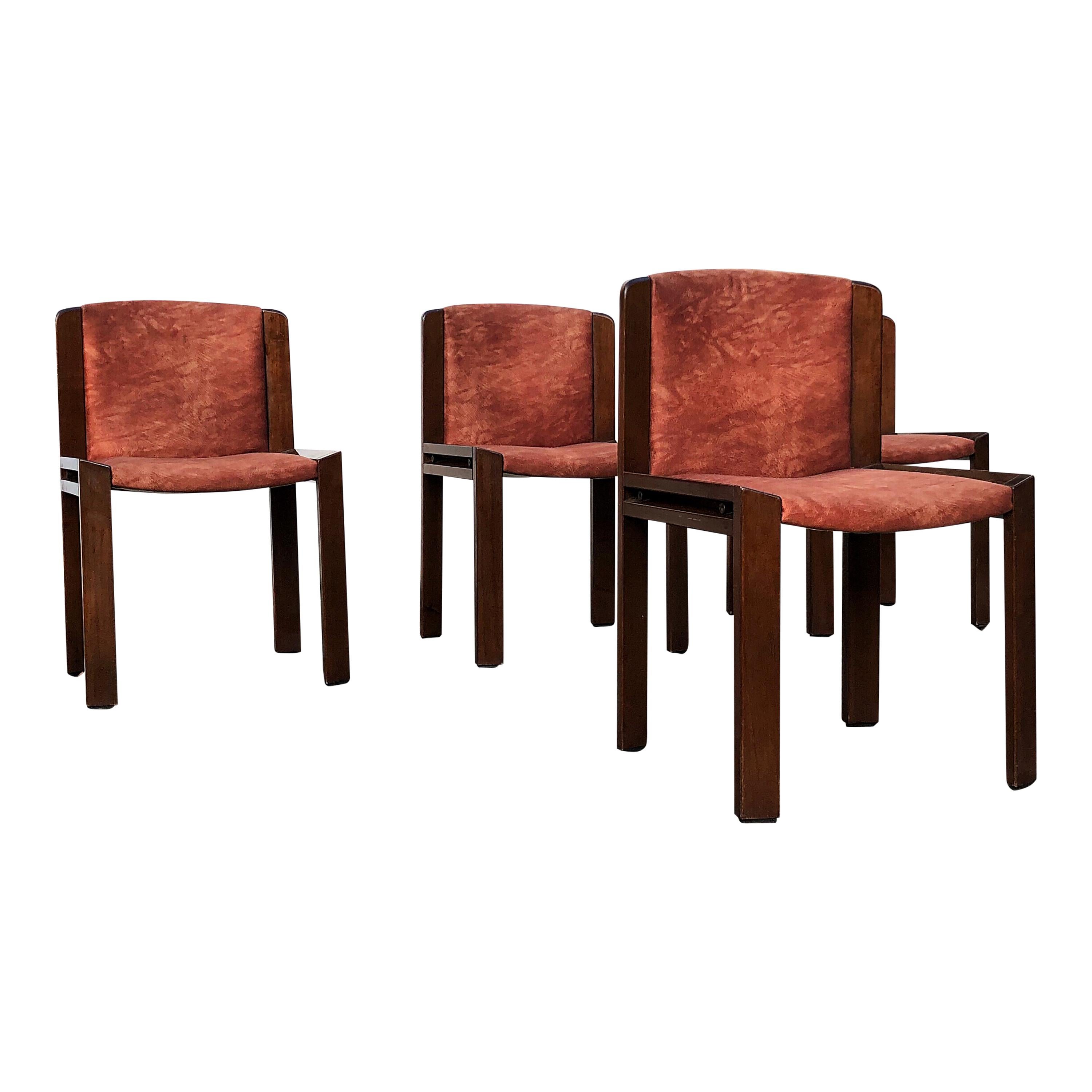 Set of four dining chairs model “300,” designed by Joe Colombo for the Italian manufacturer Pozzi 1966.

Walnut, padding covered in velvet.

Measures: Height 78 cm, width 48.5 cm, depth 44 cm.

Literature: Domus 521 (April 1973), p. d / 578;