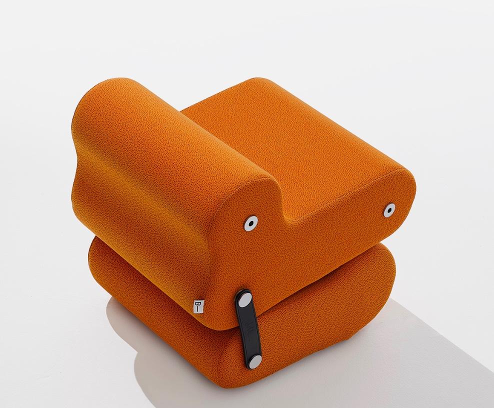Joe Colombo 'Multichair' 1970 in orange 'Sprinkles Kvadrat' for B-Line

Multichair is a convertible system consisting of two individual elements that can easily turn into a conversation/relaxation chair. This is a product designed with the total