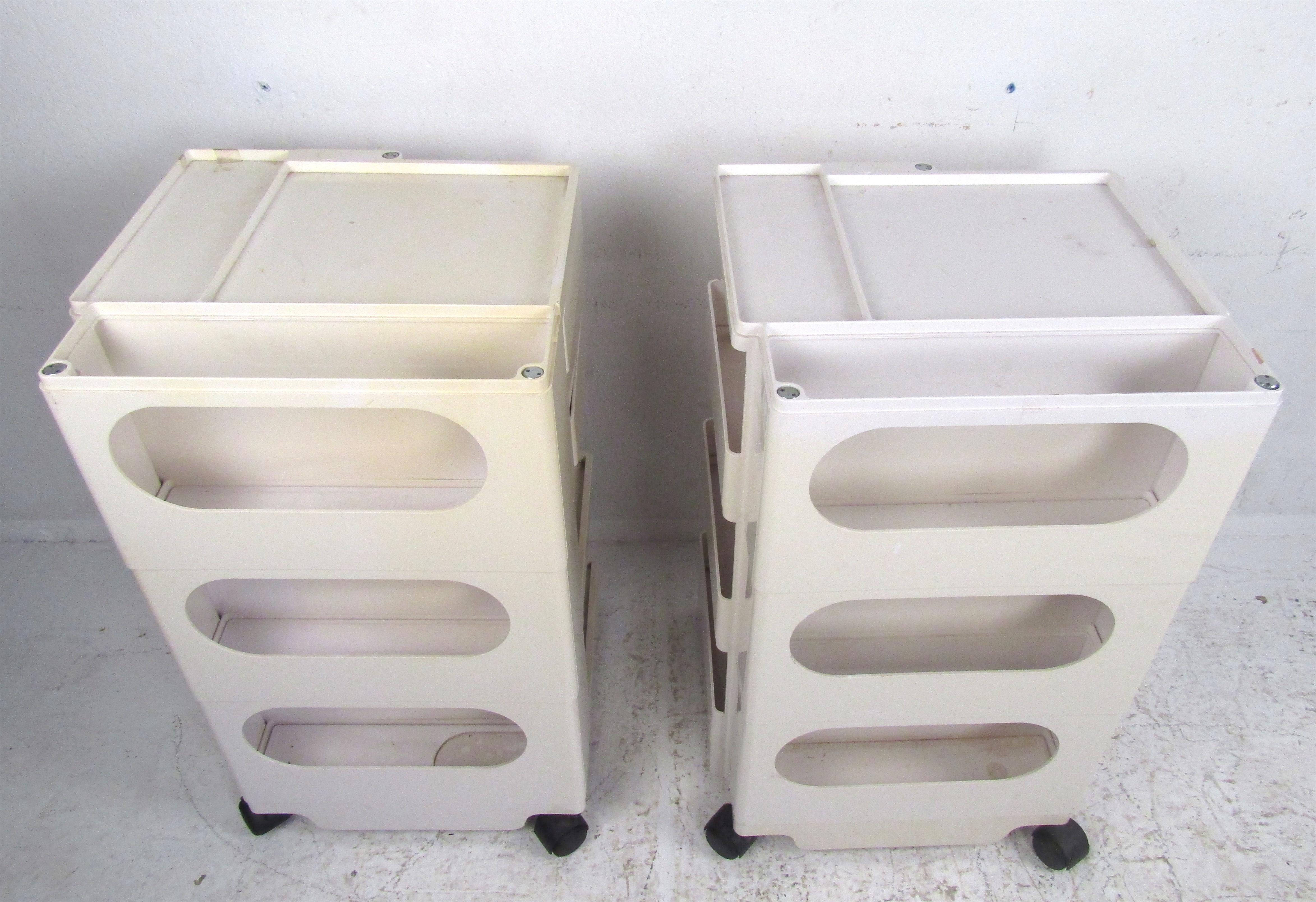 A set of vintage Joe Colombo Plastic storage carts. These unique rolling carts have ample storage with multi-angle adjustable shelves. This attractive modern organizer can be used in any room. Joe Colombo Boby is a must-have workspace organizer for