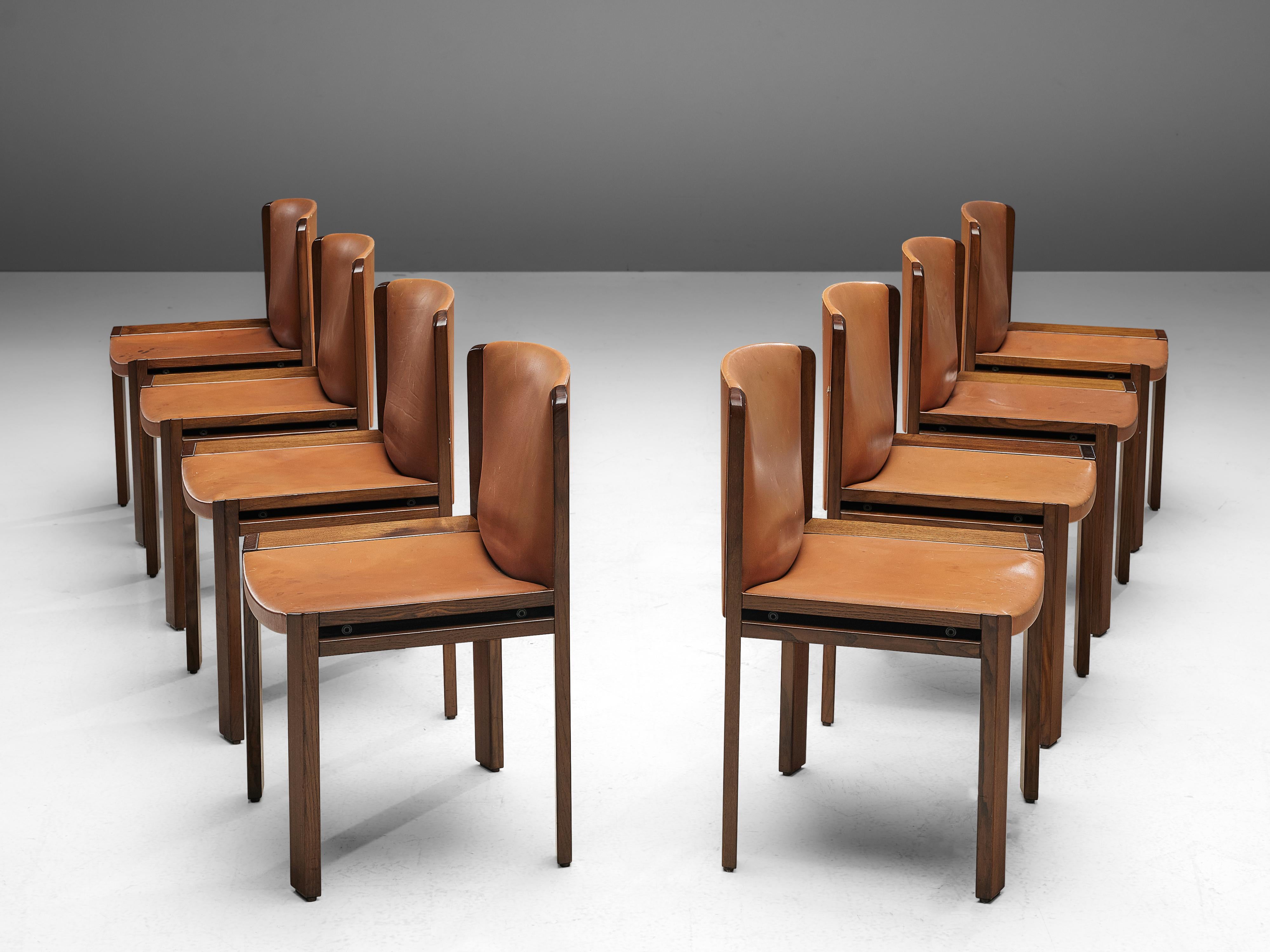 Joe Colombo for Pozzi, set of eight dining chairs '300', leather, oak, Italy, 1966

Functionalist set of eight dining chairs is designed by Joe Colombo in 1966. Colombo's fascination with functionality meant he always focused on the user, which lead