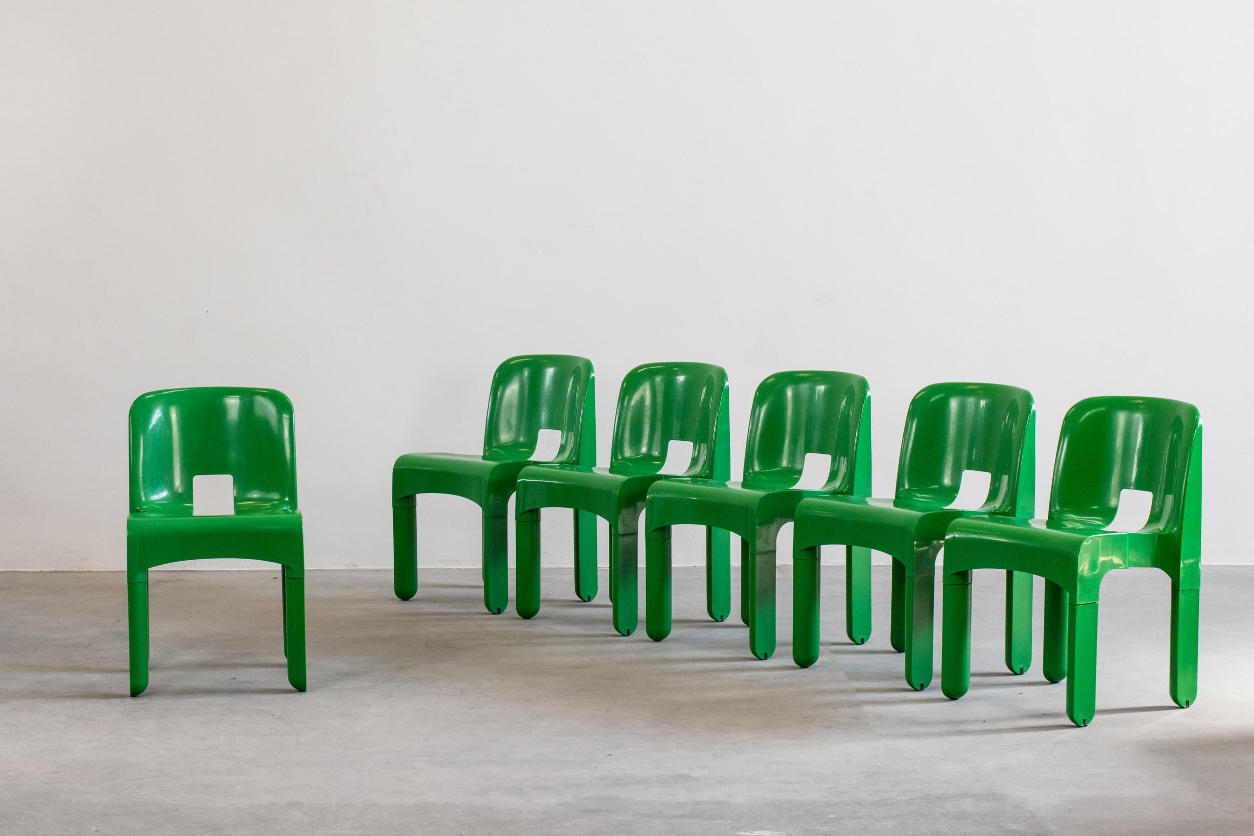 Set of six Universale chairs in green plastic, designed by Joe Colombo and produced by Kartell in the late 60s. 
Also for out door use.