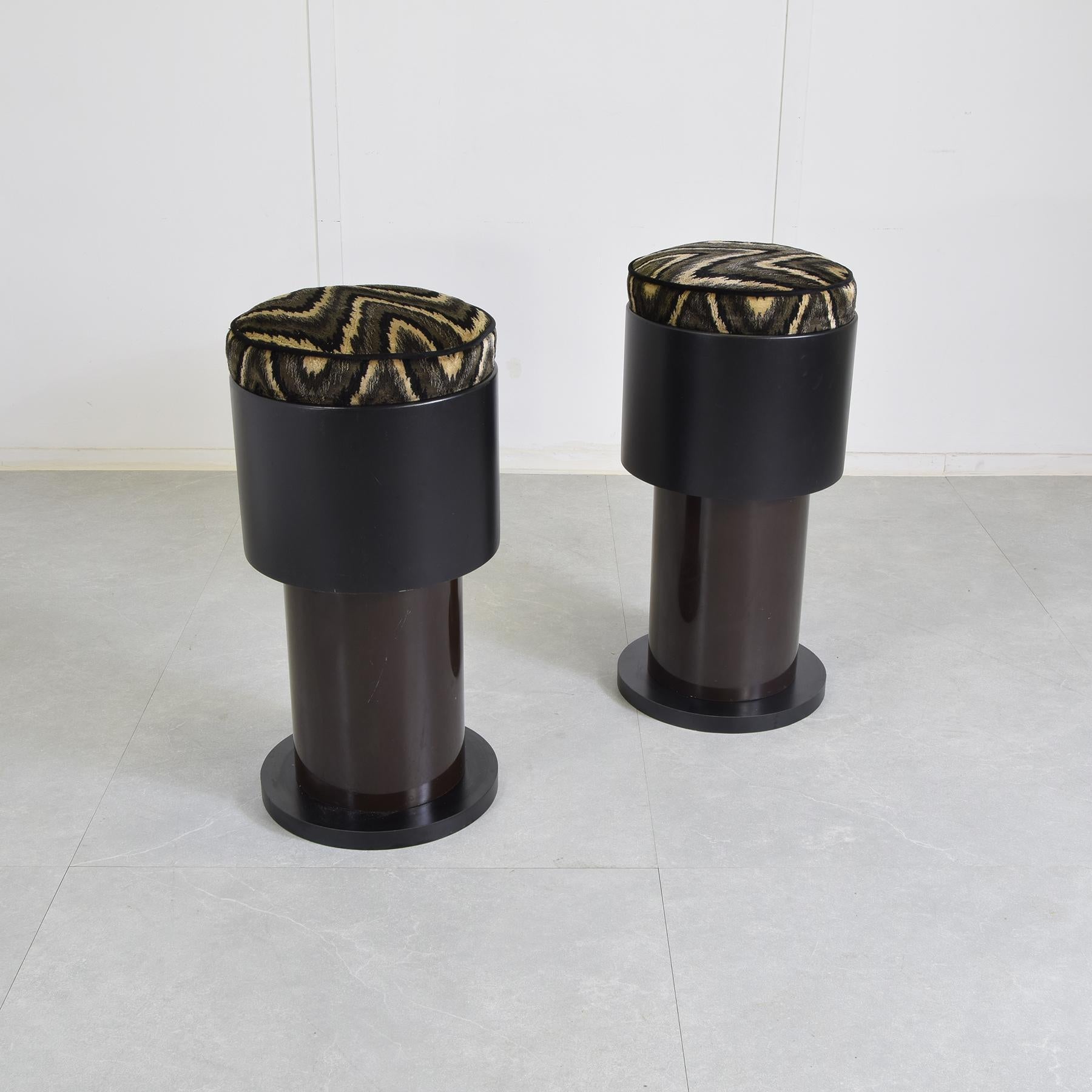 Double-cylinder frame in black and coffee-colored coated wood with dark base and original Missoni fabric seat. Maximum diameter 35 cm with a height of 71. remake of the seat designed by Joe Colombo for his 1960s pop-up bar cabinet. these pieces were