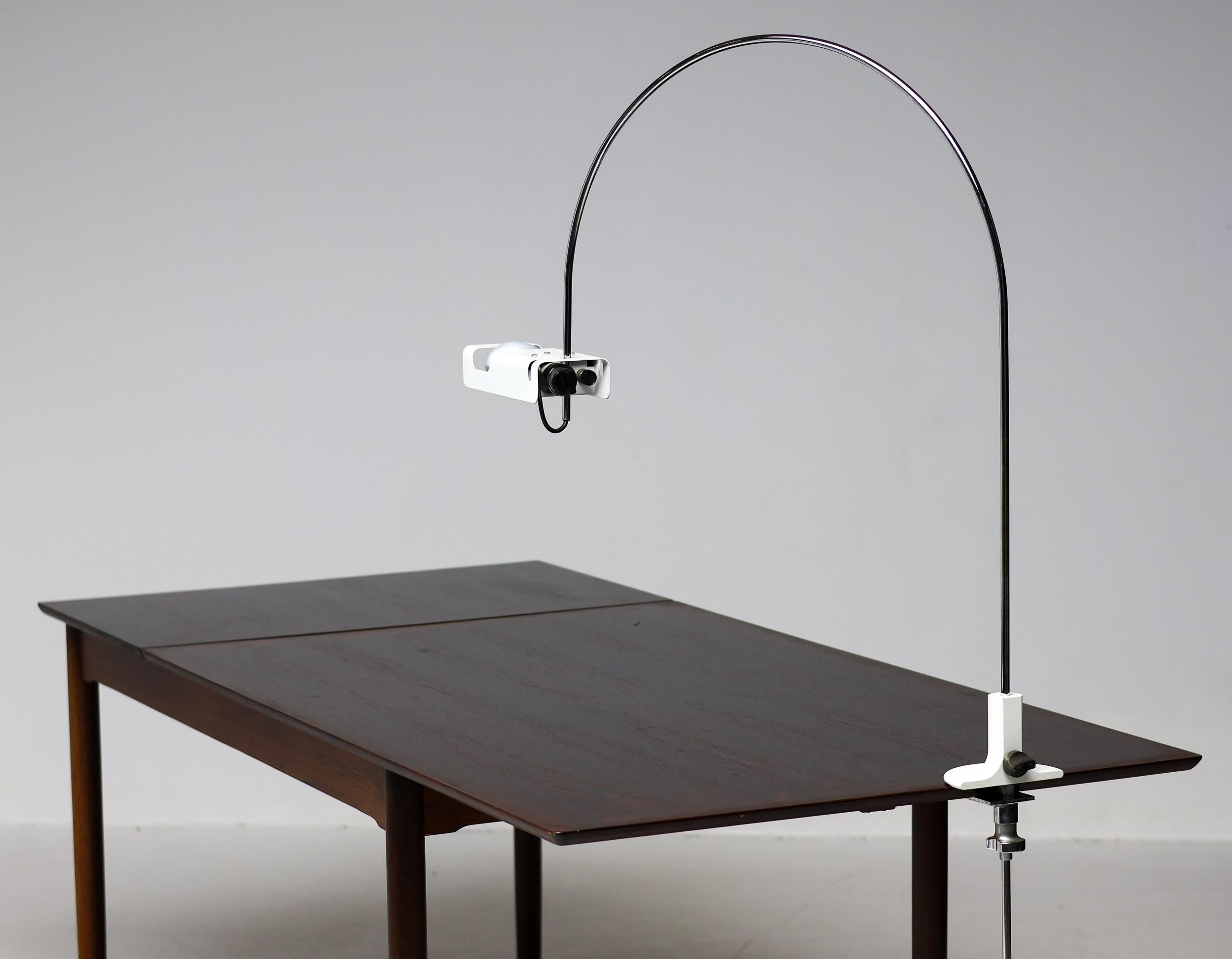 Early Spider arc lamp by Joe Colombo. The 'Spider' lamp series was designed by Joe Colombo in 1965 for Oluce, Italy, A series of floor and table lamps with enameled sheet metal reflector purposely designed to take a special horizontal spot light