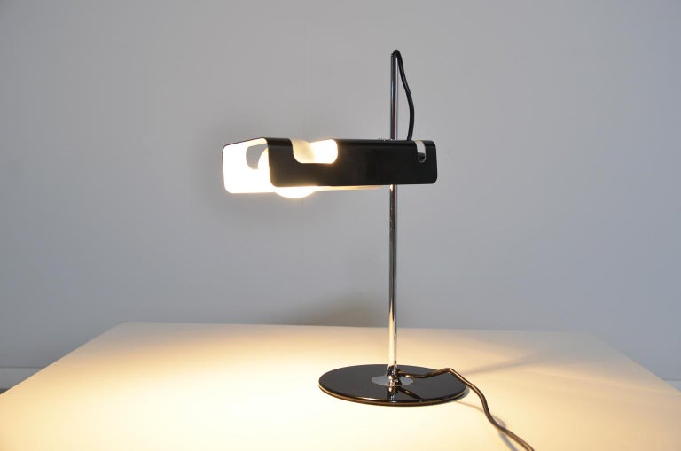 This black spider lamp spreads a direct light and therefore works perfect as a desk lamp. The reflector can be tilted left and right and moved up and down.
.