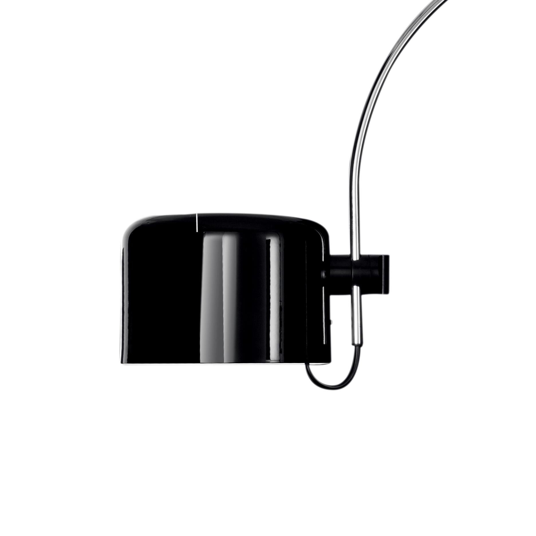 Wall lamp 'Coupé' designed by Joe Colombo in 1967.
Adjustable rotating metal wall lamp giving direct and reflected light. 
Manufactured by Oluce, Italy.

The Coupé series, designed by Joe Colombo, was initially conceived as a variation of the