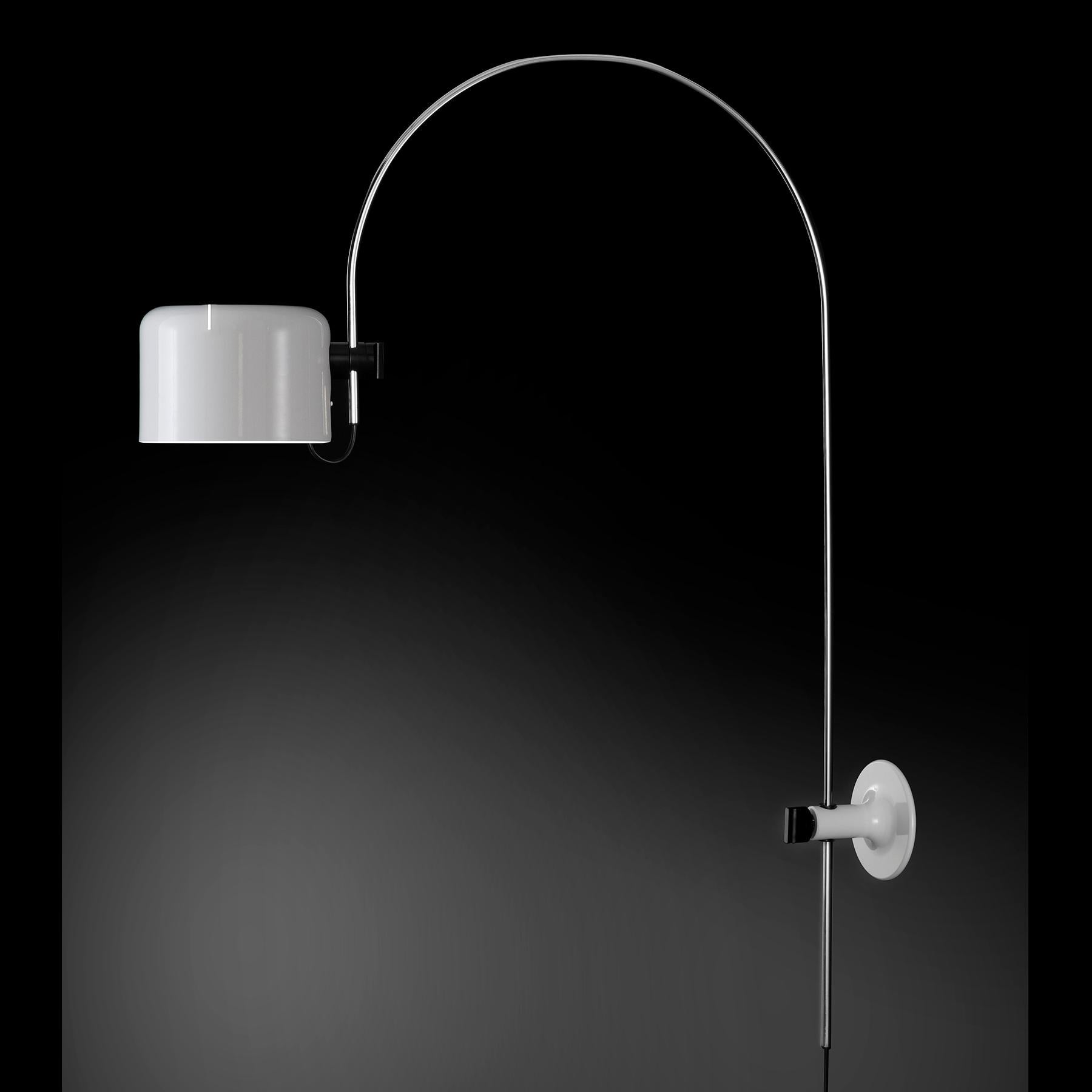 Wall lamp 'Coupé' designed by Joe Colombo in 1967.
Adjustable rotating metal wall lamp giving direct and reflected light. 
Manufactured by Oluce, Italy.

The Coupé series, designed by Joe Colombo, was initially conceived as a variation of the Spider