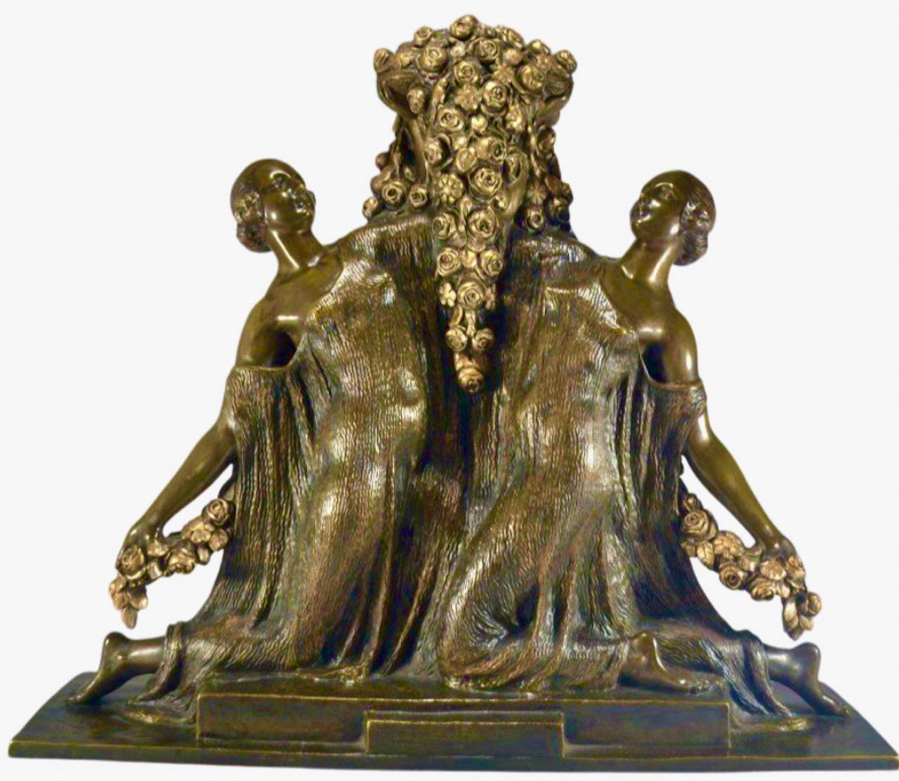 A very rare and impressive patinated bronze sculpture of two women holding an extensive array of rose garlands. Quality foundry and all original genuine patina. The piece is signed “Guirande” on the bronze, a well-known pseudonym for Joe Descomps.