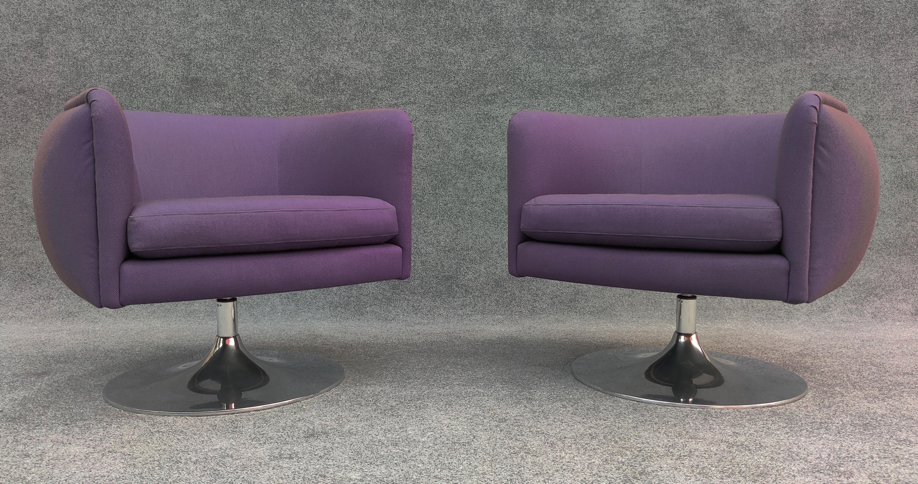 One of Joe D'Urso's most iconic designs, this pair of chairs was produced in 2008 by Knoll. This pair forgoes the height adjustmeant feature in favor of the elegant 360 swivel feature, which returns the chair to its original orientation every time.