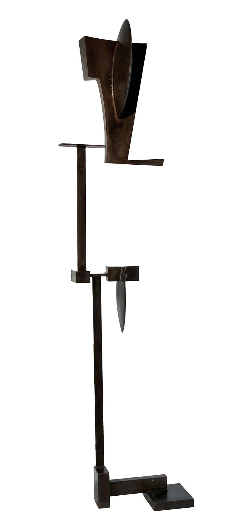 Minimalist, abstract geometric standing sculpture in dark brown oxidized steel
"Some Guy #2" by Joe Wheaton, made in 2005
oxidized steel, 80 x 17.5 x 15 inches
Freestanding sculpture with stable base
Artist signature and date is located on the base