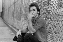 Bruce Springsteen by Schoolyard Fence, NY Aug. 1979