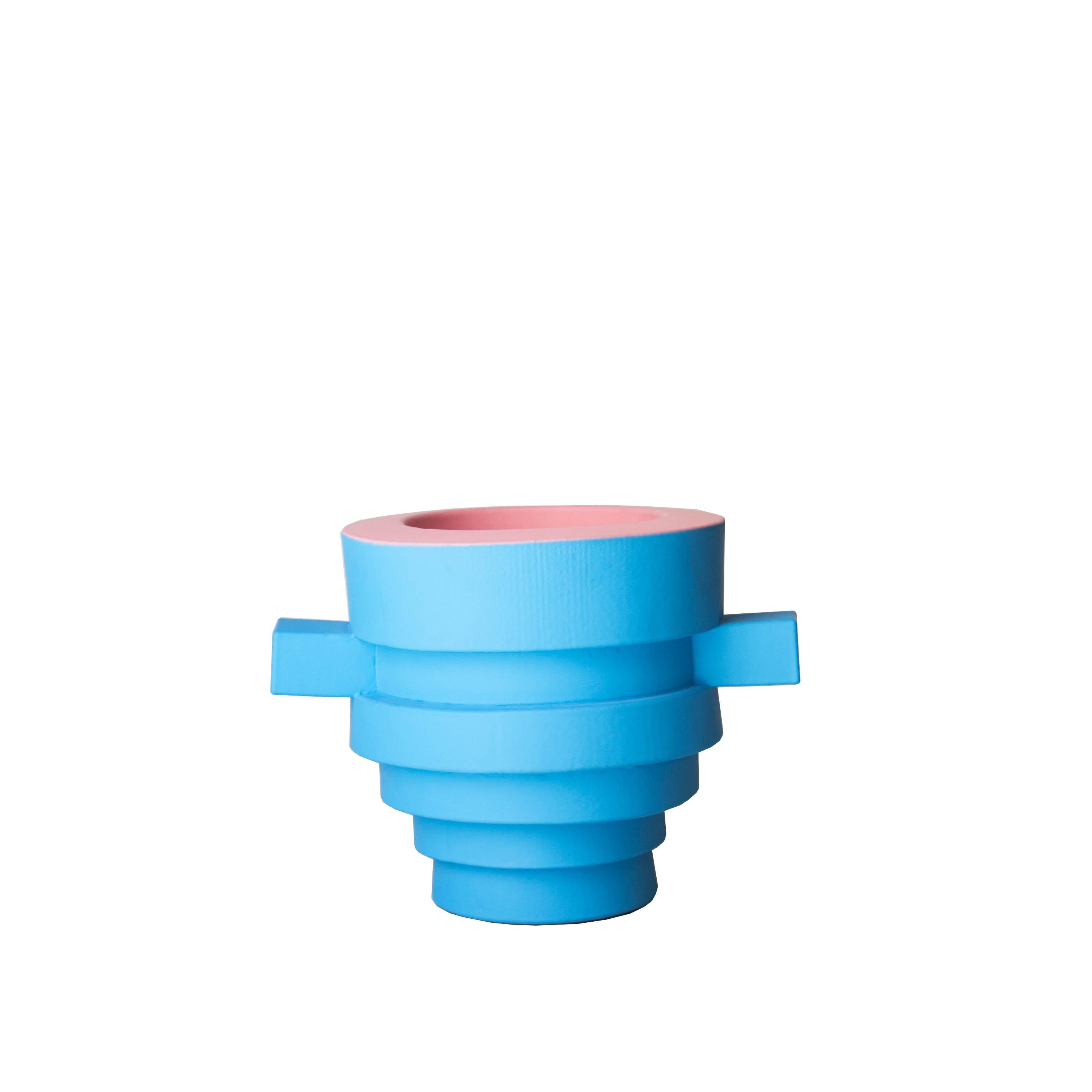 Vases designed by Joel Blanco, with foam structure and rubber coated painted in blue and pink.