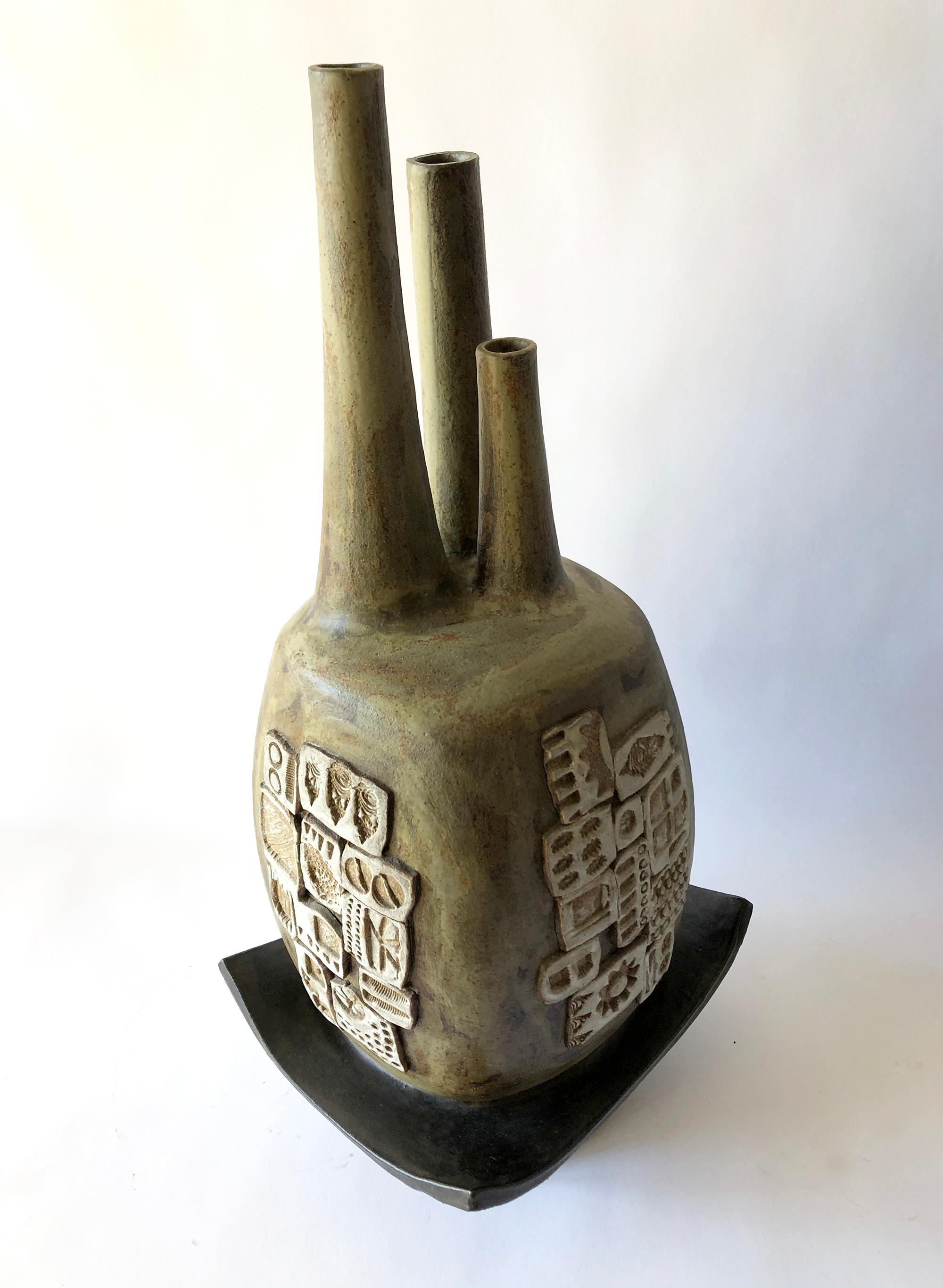 Triple spouted ceramic sculpture vessel created by California studio potter Joel Edwards. Piece measures 24