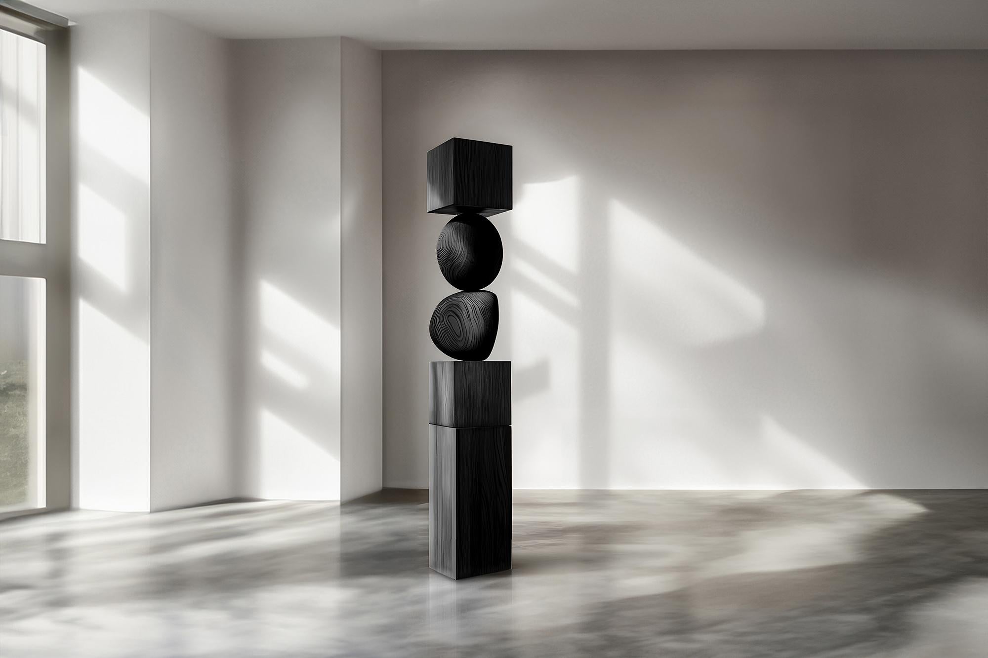Joel Escalona's Creation, Dark Black Solid Wood Totem, Still Stand No84
——

Joel Escalona's wooden standing sculptures are objects of raw beauty and serene grace. Each one is a testament to the power of the material, with smooth curves that flow