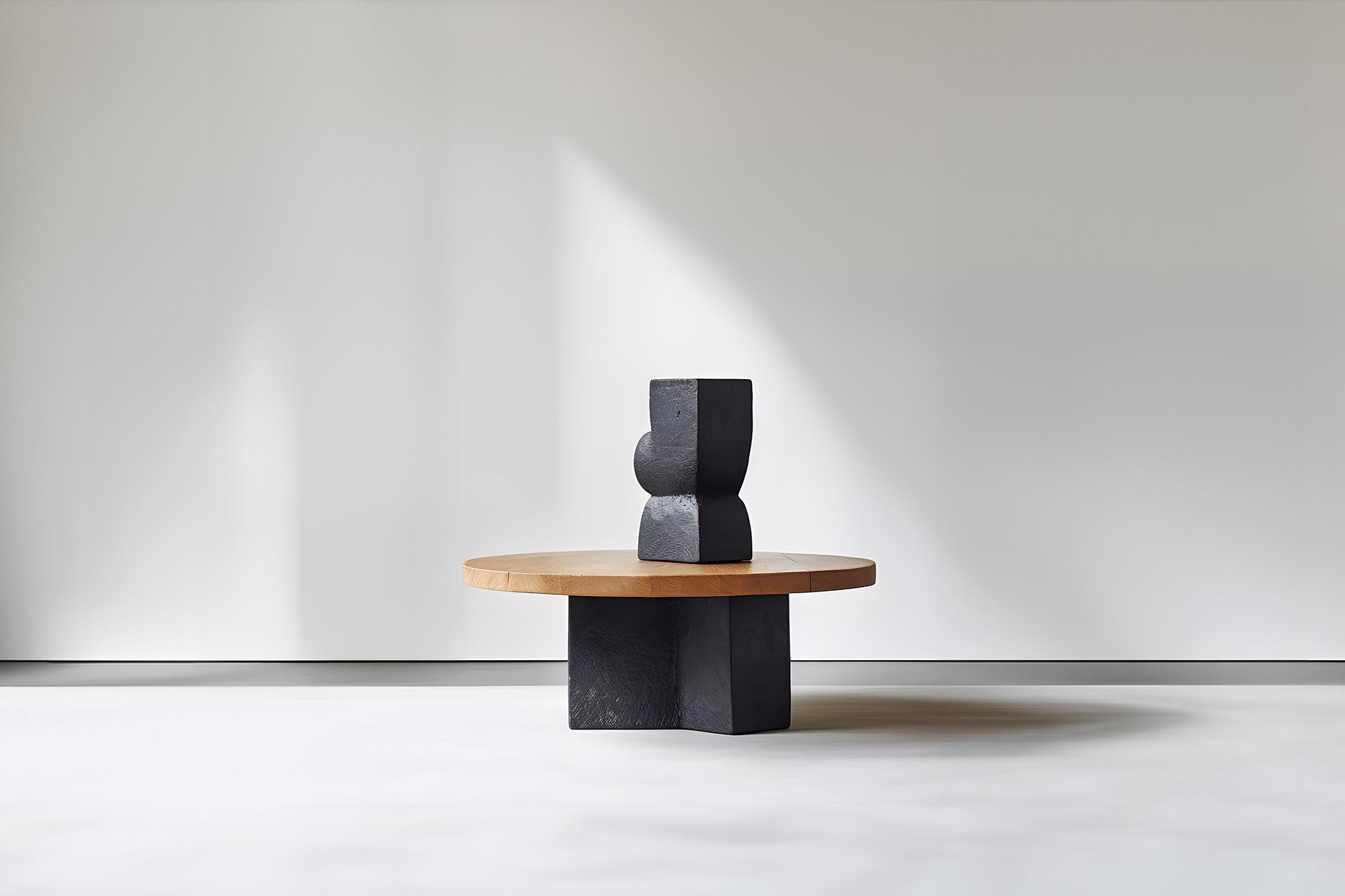Joel Escalona's Unseen Force #39 Coffee Table Art, Solid Wood Decor

Table basse sculpturale en bois massif avec une finition naturelle à base d'eau ou carbonisée. En raison de la nature du processus de production, chaque pièce peut varier en termes