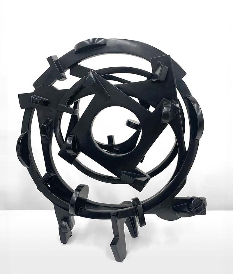 "Engine" by Joel Perlman
Abstract sculpture in cast bronze

Joel Perlman has been creating complex sculptures out of steel, bronze, and aluminum since the early 1970's. While minimalism was the predominant style of his genration, Perlman chose to