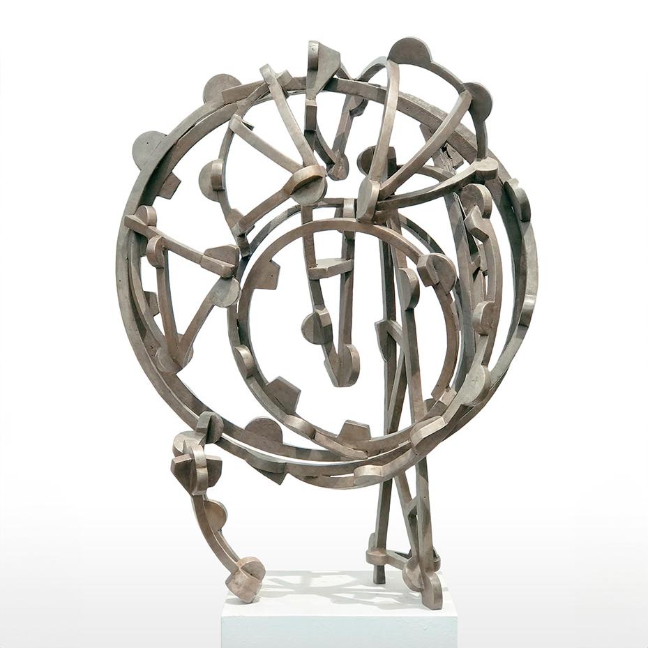 "Grey Gear" by Joel Perlman
Abstract sculpture in bronze

Joel Perlman has been creating complex sculptures out of steel, bronze, and aluminum since the early 1970's. While minimalism was the predominant style of his genration, Perlman chose to push