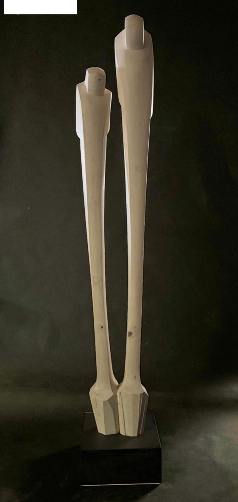 Medium: Bleached poplar

As an artist I strive to create elegant sculptures that capture the true essence of the subject matter. Form, line and surface are used as the visual language. The figure is abstracted to a minimalist form, void of any
