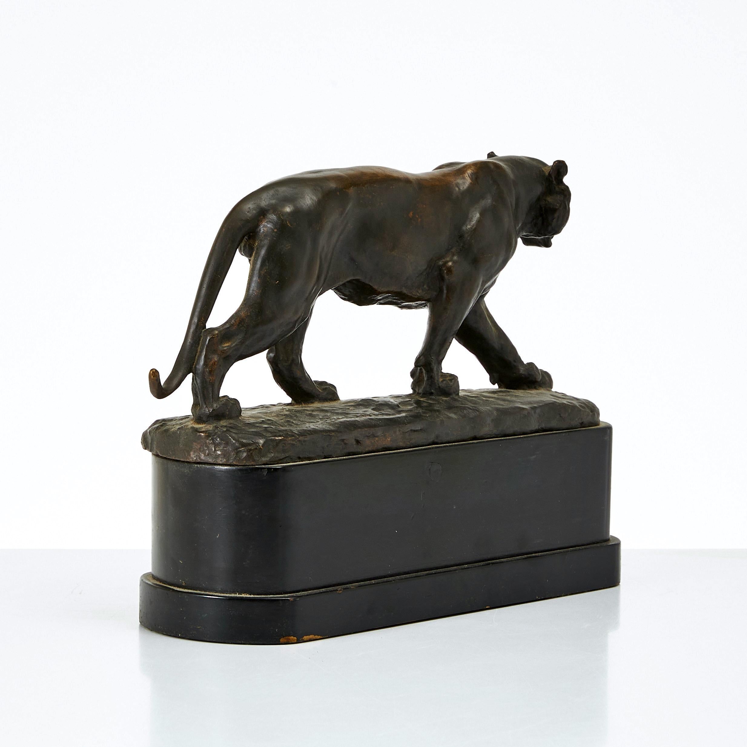 
Sculpture of a walking tiger in dark patinated bronze by Johan Axel Wetterlund (1858-1927), signed J. A. Wetterlund, mounted on a black-painted wooden base. This finely modelled bronze sculpture of a walking tiger exemplifies the naturalistic