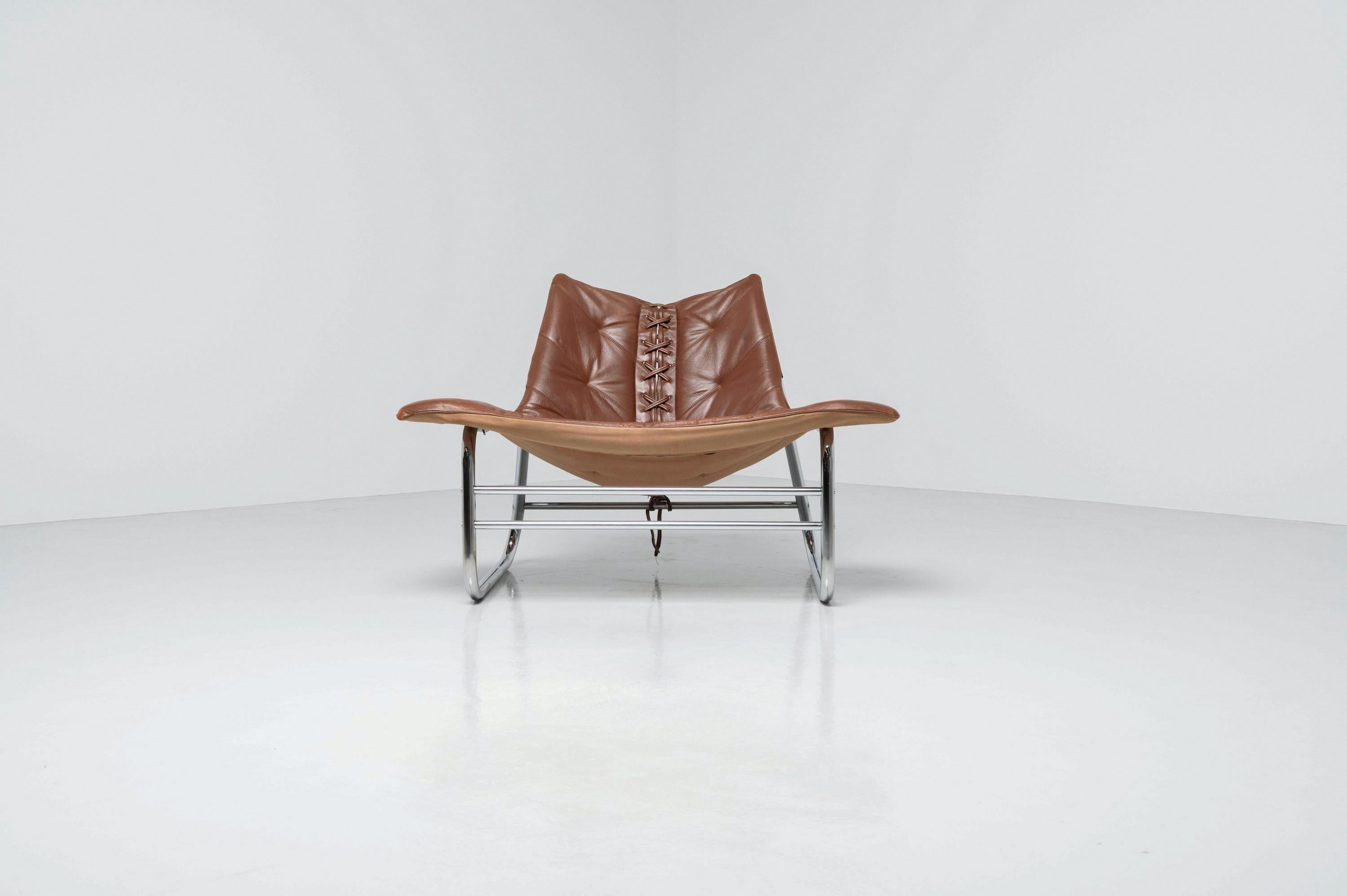 Not often does one of Johan Bertils' designs come up for sale, but hereby there is one beautiful example currently available. A stunning and very comfortable 'Corset' lounge chair made in Sweden by Swed-Form in 1970. The chair looks very