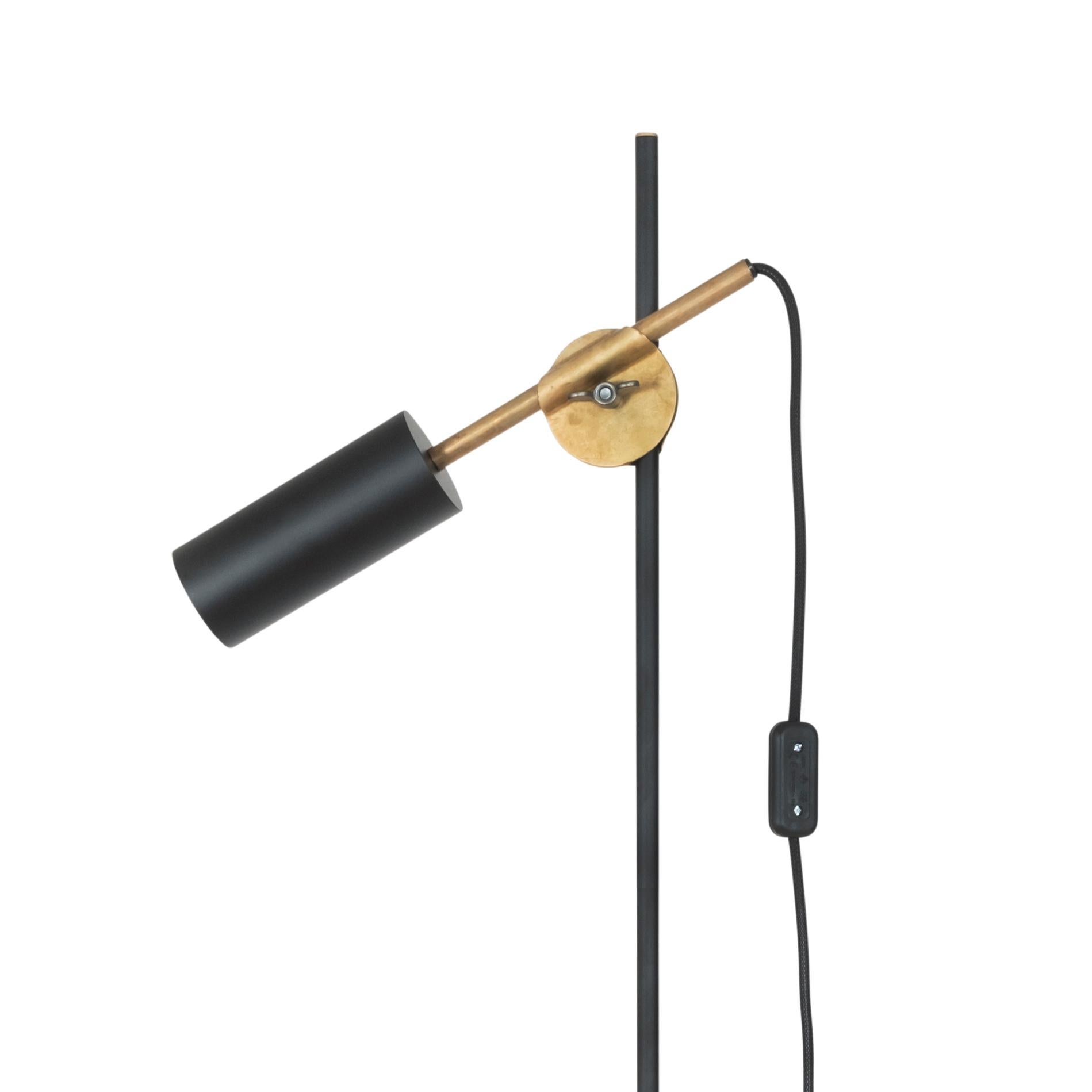 Floor lamp designed by Johan Carpner manufactured by Konsthantverk Tyringe in Sweden.

STAV floor
D. 400 mm
H. 1400 mm
Max 10 W GU10
2451-8 Black/raw brass

The lamps are wiring with standard Europe wiring.

Stav floor is a lamp series that is