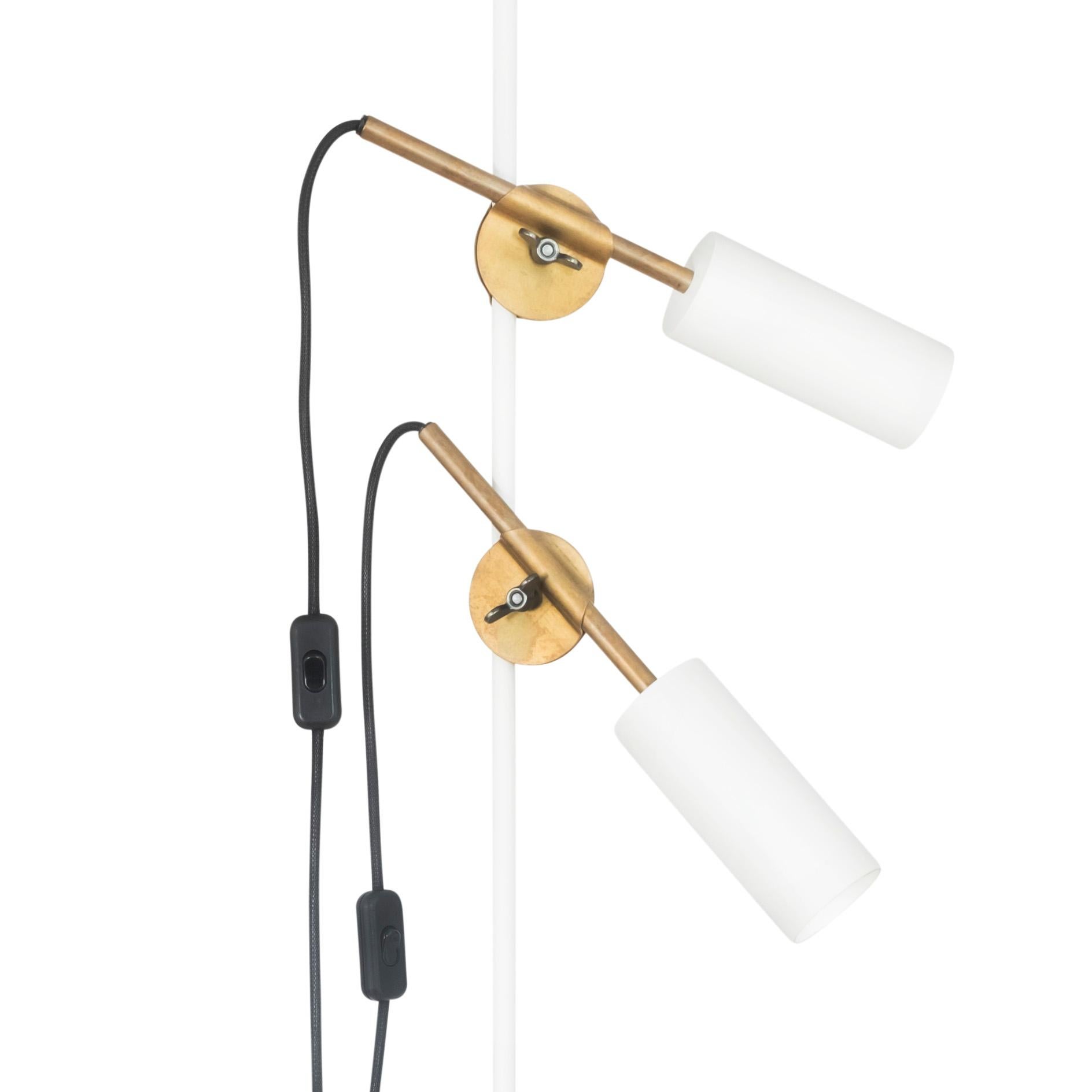 Johan Carpner STAV two arms floor lamp white brass by Konsthantverk and manufactured by Konsthantverk.

The production of lamps, wall lights and floor lamps are manufactured using craftsman’s techniques with the same materials and techniques as