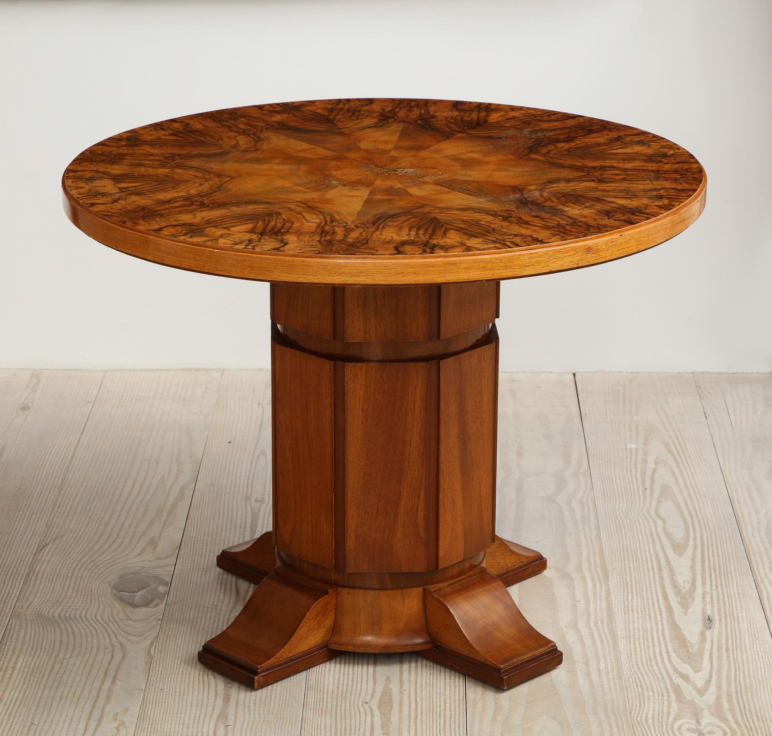 Johan Gudmann Rohde (1856 Randers - Hellerup, Denmark 1835), table with centre pillar, origin: Denmark, circa 1900 - 1920, mahogany with table top of root veneer in star pattern.