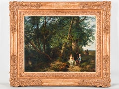 Couple pique-niquant sous un grand arbre