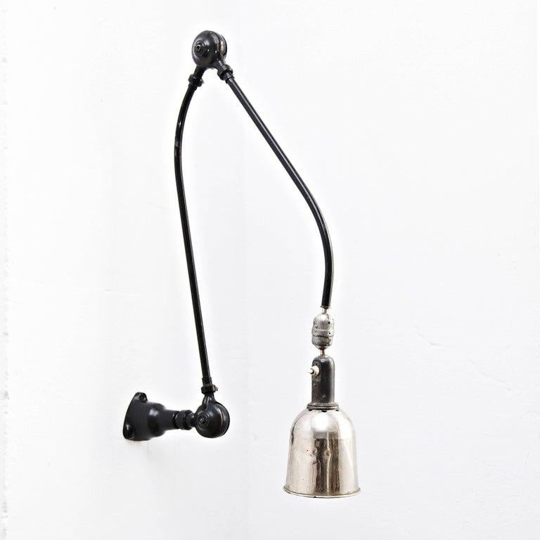 Wall lamp designed by Johan Petter Johansson.
Manufactured by Triplex (Sweden), circa 1930.
Aluminium and steel.
