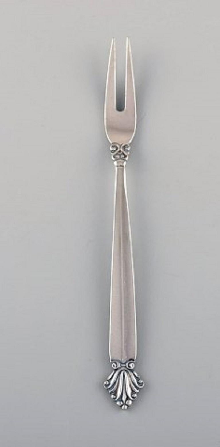 Johan Rohde for Georg Jensen. Six early Acanthus cold meat forks in sterling silver, 1920s-1930s.
Measures: Length 15.5 cm.
Stamped.
In excellent condition.
Our skilled Georg Jensen silversmith / jeweler can polish all silver and gold so that it