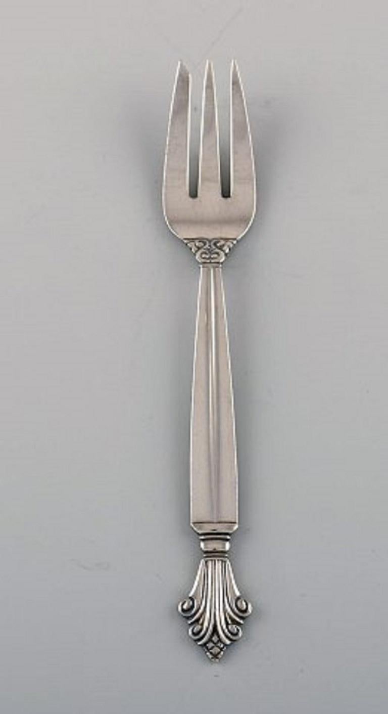 Johan Rohde for Georg Jensen. Three early Acanthus pastry forks in sterling silver.
Measures: Length 14.2 cm.
Stamped.
In excellent condition.
Our skilled Georg Jensen silversmith / jeweler can polish all silver and gold so that it looks like
