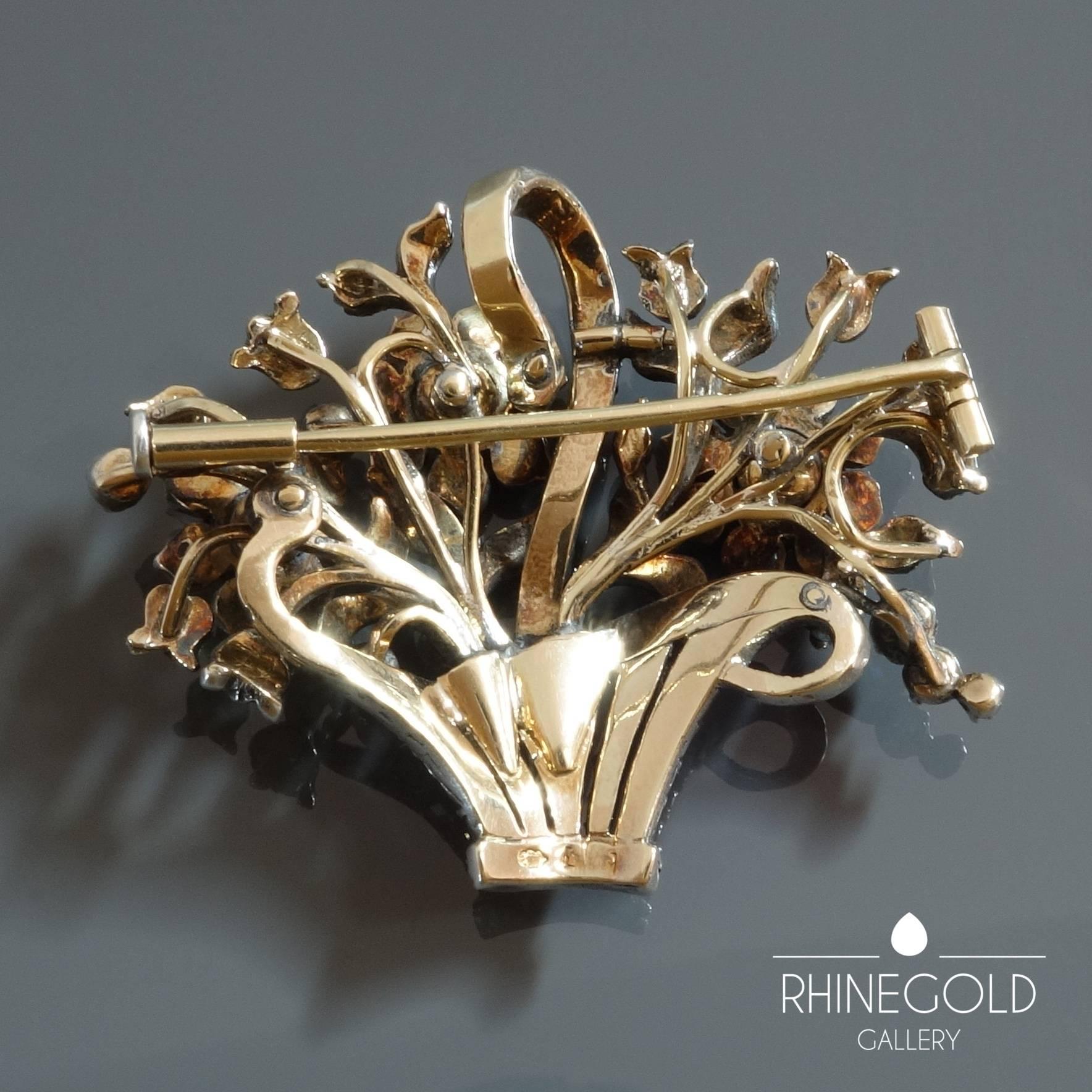 Johan Rozendaal Rose Cut Diamond Gold Silver Giadinetto Flower Basket Brooch
Silver on 14k yellow gold, rose cut diamonds (approx. 2.3 carat in total)
4.1 cm by 3.2 cm (approx. 1 5/8” by 1 ¼”)
Weight approx. 13.5 grams
Marks (on brooch and needle):