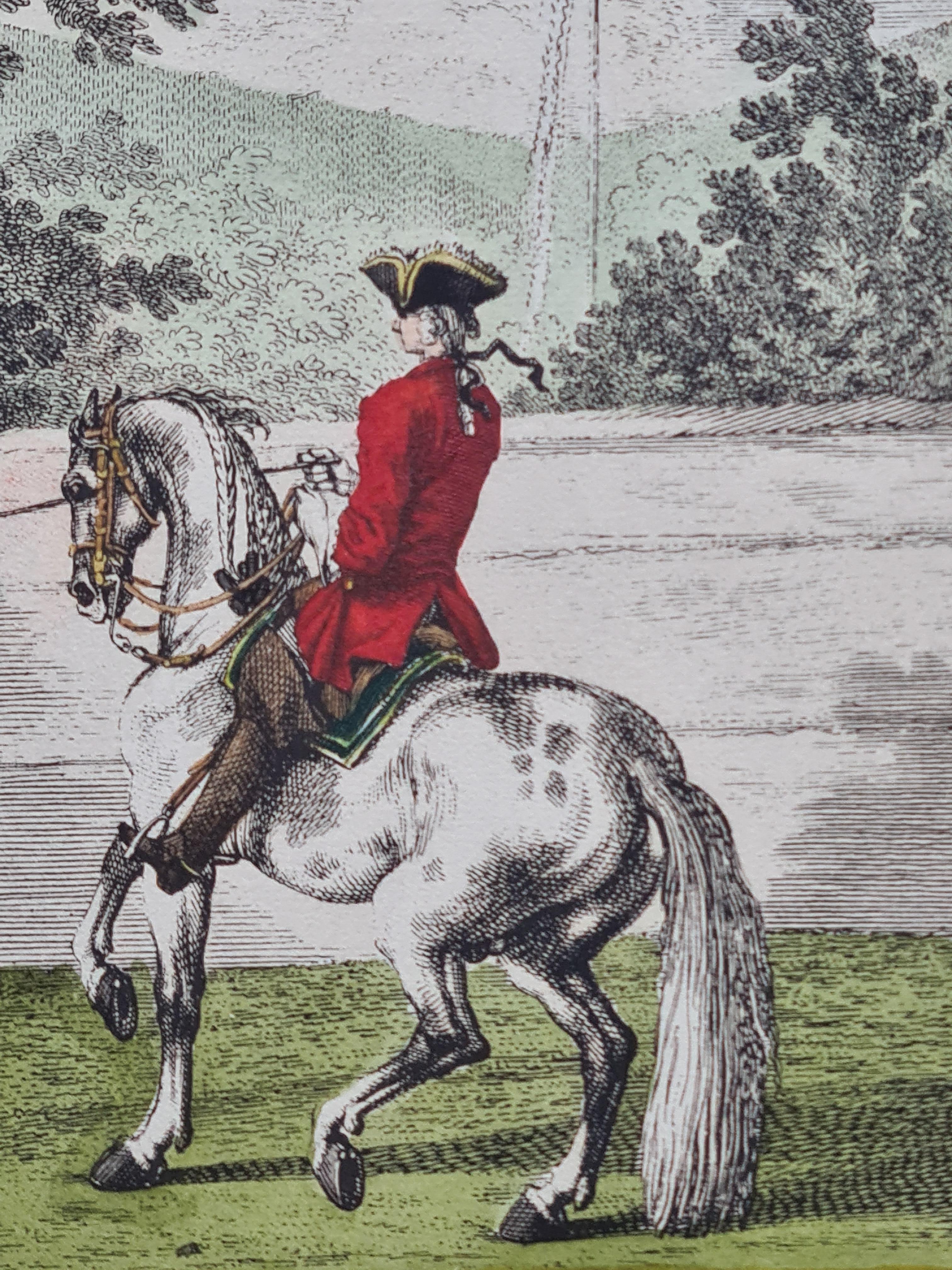 Two Mid 18th century hand coloured copper plate engravings of equestrian subjects by Johann Elias Ridinger. Initial signed 'in the plate' bottom right. Presented in fine gilt wood frames under glass with a hand coloured mount, ink and gilt foil