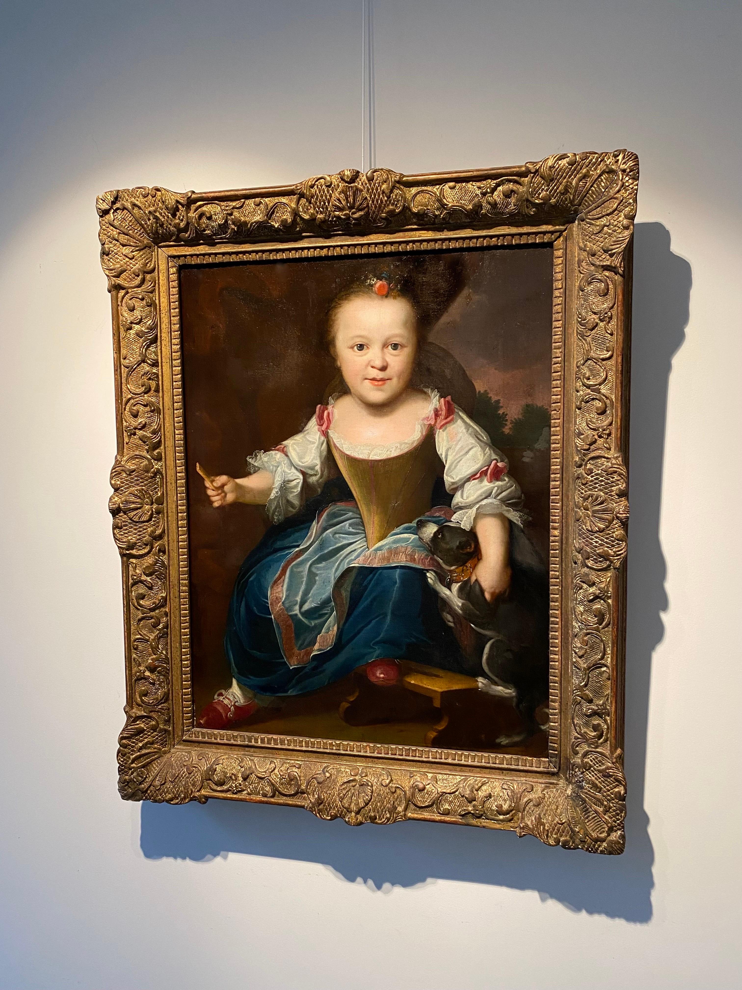 girl holding demon dog painting