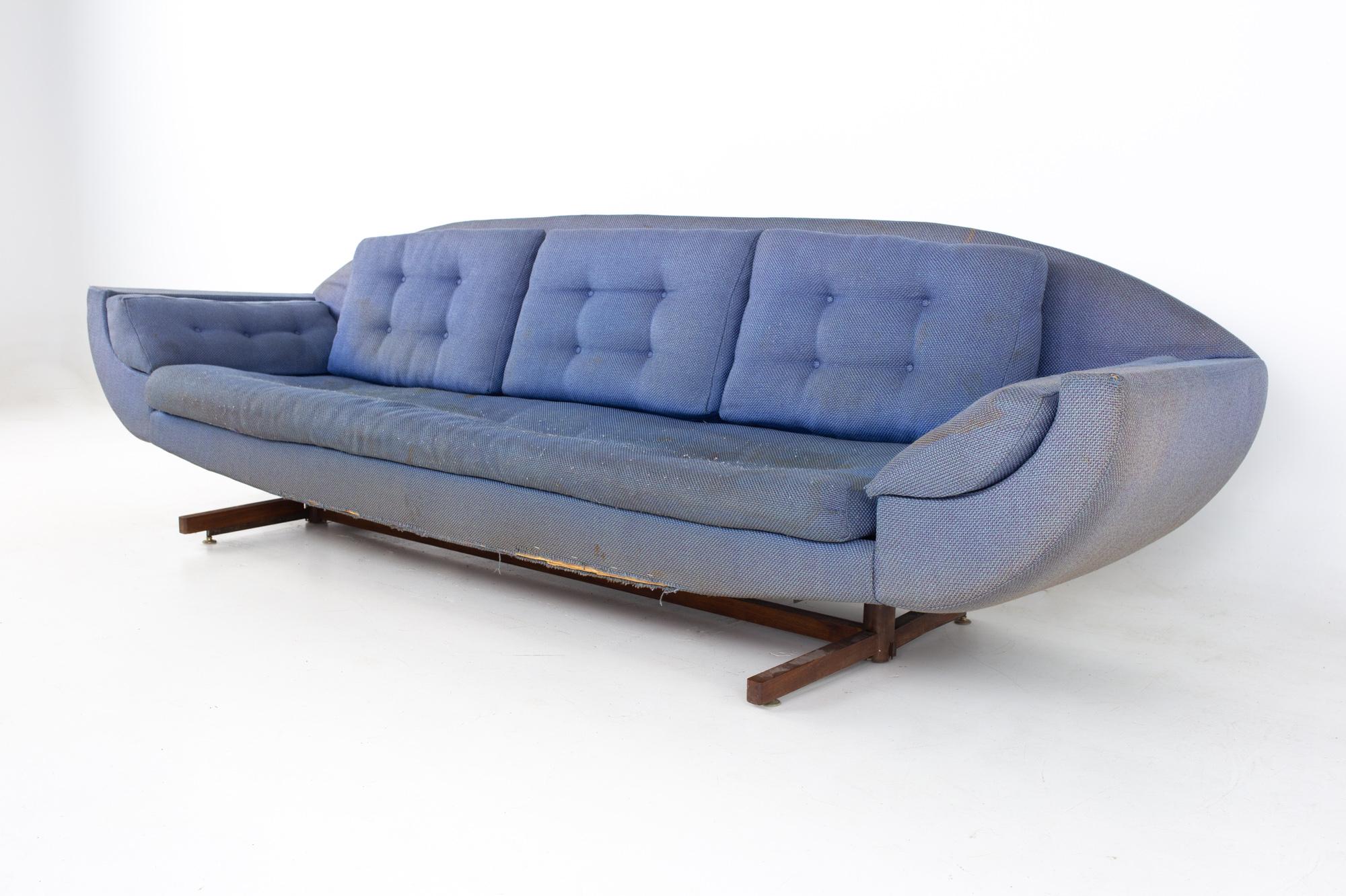 Johannes Andersen Capri style mid century Gondola sofa
Sofa measures: 108 wide x 34 deep x 31.5 inches high, with a seat height of 16 inches

All pieces of furniture can be had in what we call restored vintage condition. That means the piece is